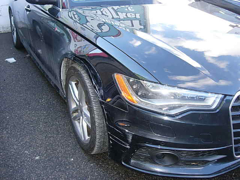 Nikon E5200 sample photo. Damaged audi in fender bender boston - allston collision center - before photography