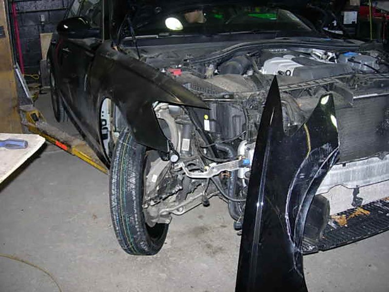Nikon E5200 sample photo. Damaged audi in fender bender boston - allston collision center - during photography
