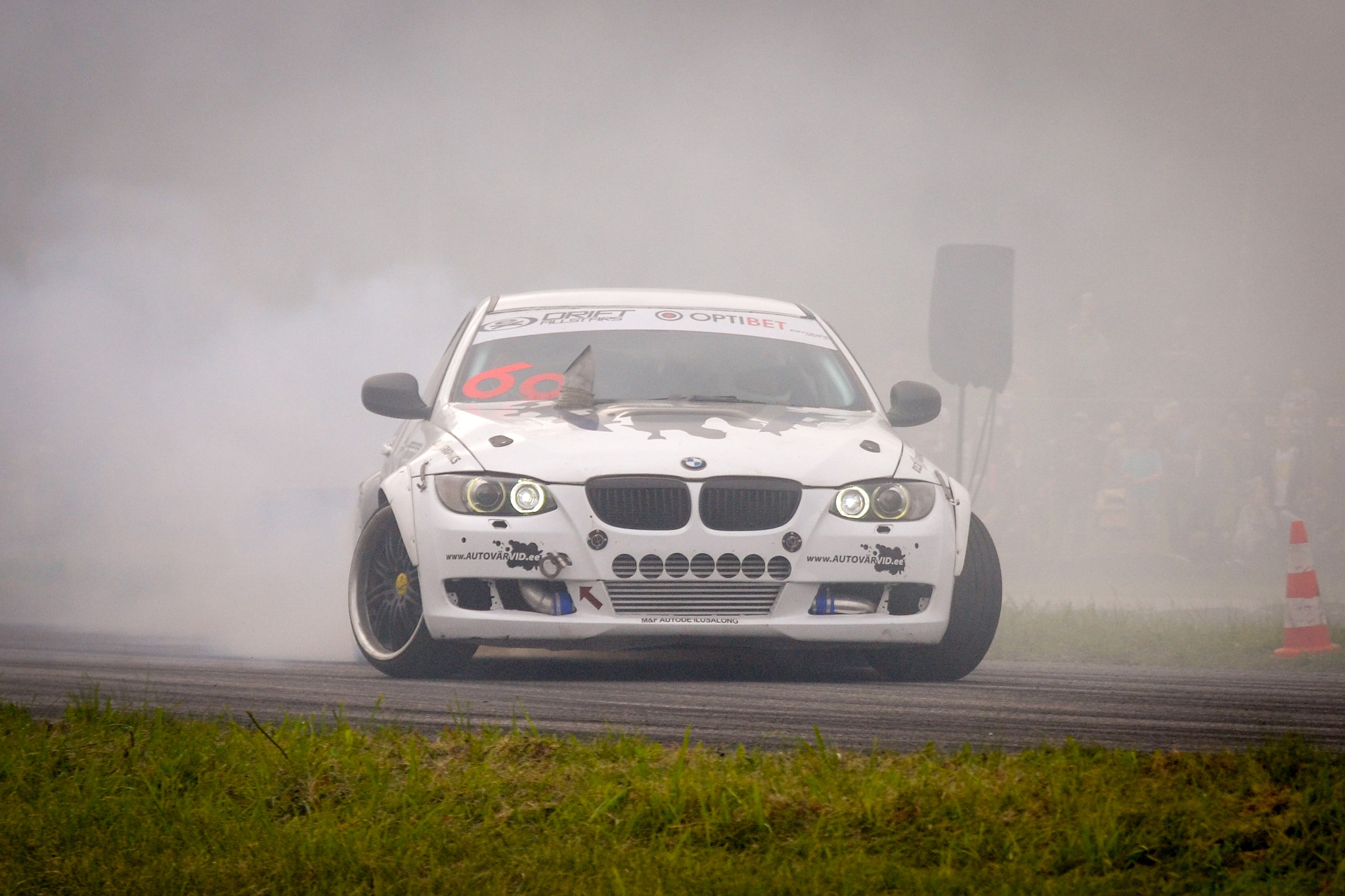 Nikon D3100 + Tamron SP 70-300mm F4-5.6 Di VC USD sample photo. Bmw make some smoke photography