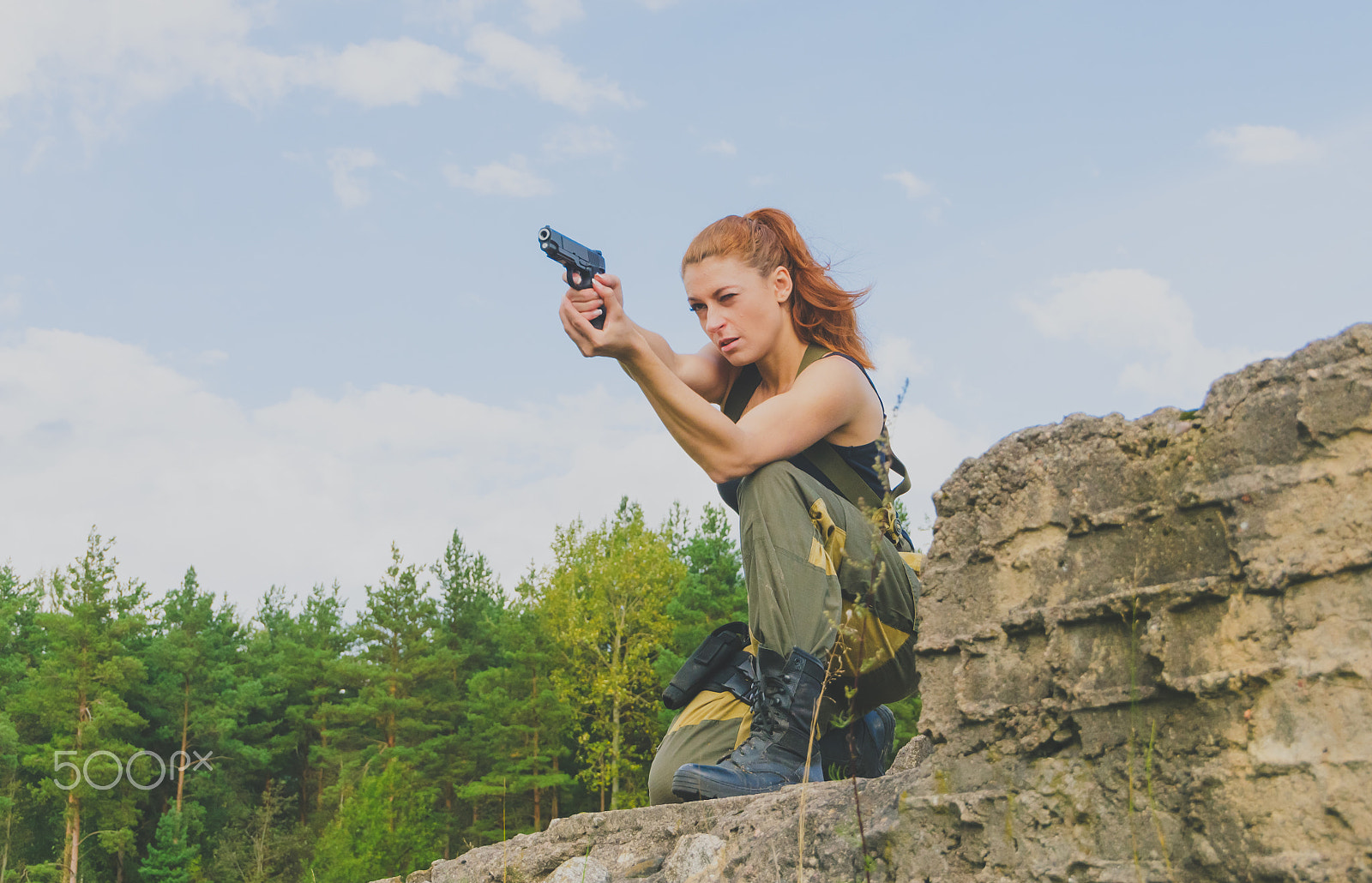 Nikon D7000 + Sigma 18-250mm F3.5-6.3 DC OS HSM sample photo. Redhead girl with a kalashnikov. photography