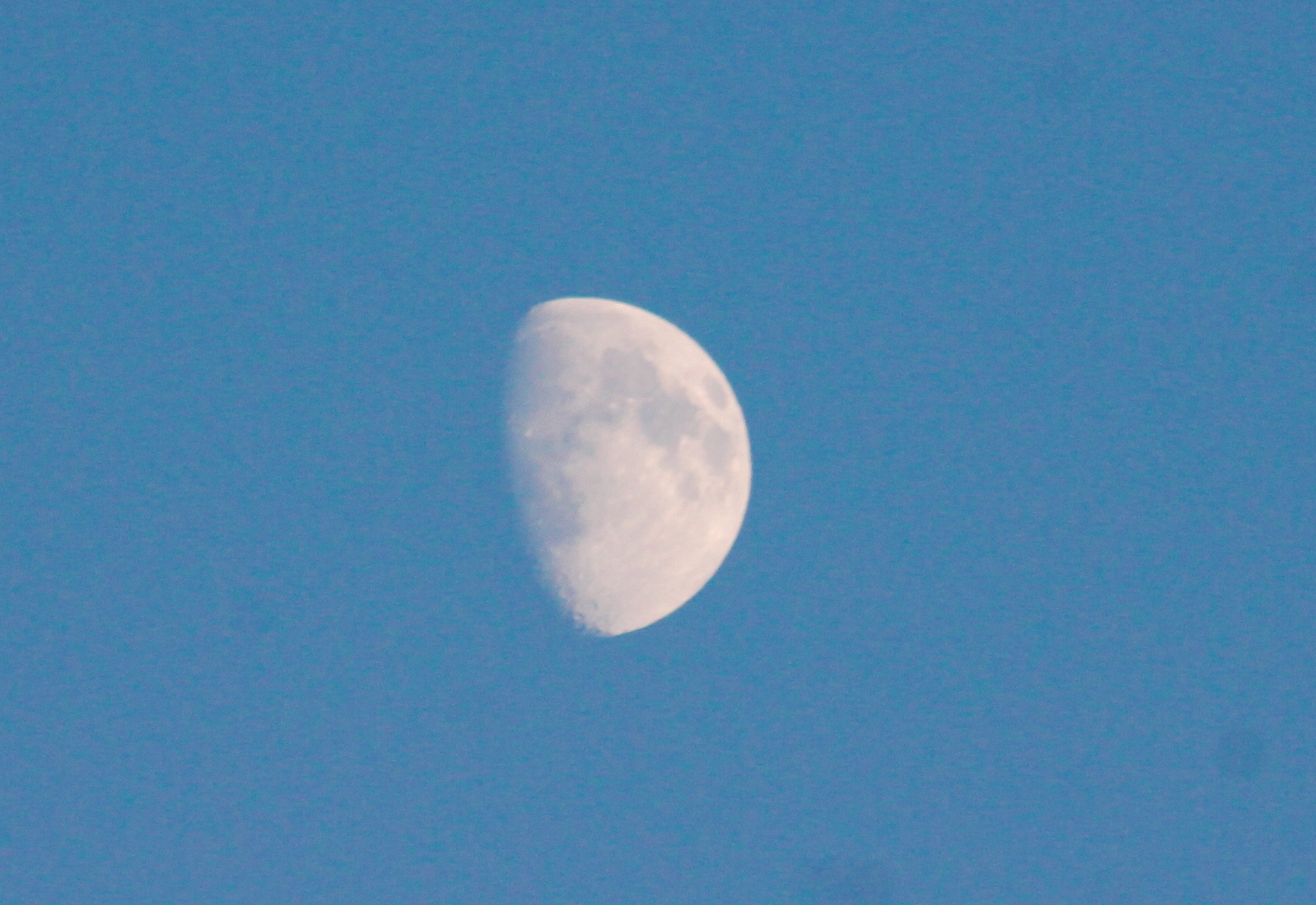 Canon EOS 1100D (EOS Rebel T3 / EOS Kiss X50) sample photo. The moon at dusk in clear blue skye's photography