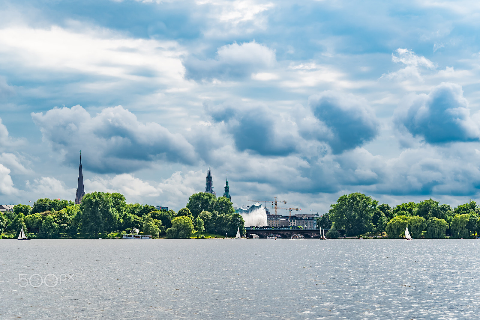 Nikon D610 + Nikon AF-S Micro-Nikkor 60mm F2.8G ED sample photo. Alster lake with sail boats and hamburg cityscape in background  photography