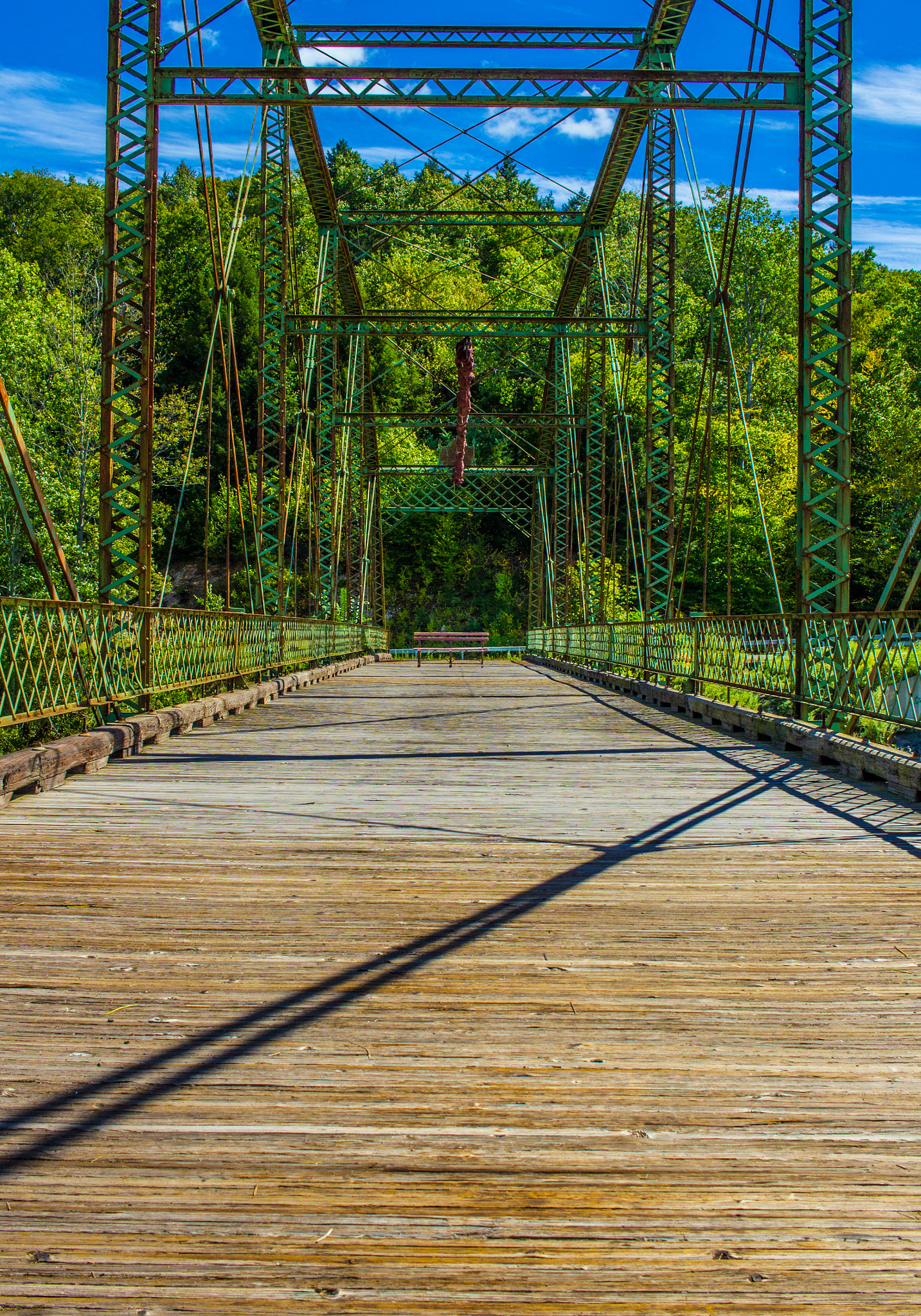 Canon EF-S 24mm F2.8 STM sample photo. Bench on a bridge photography