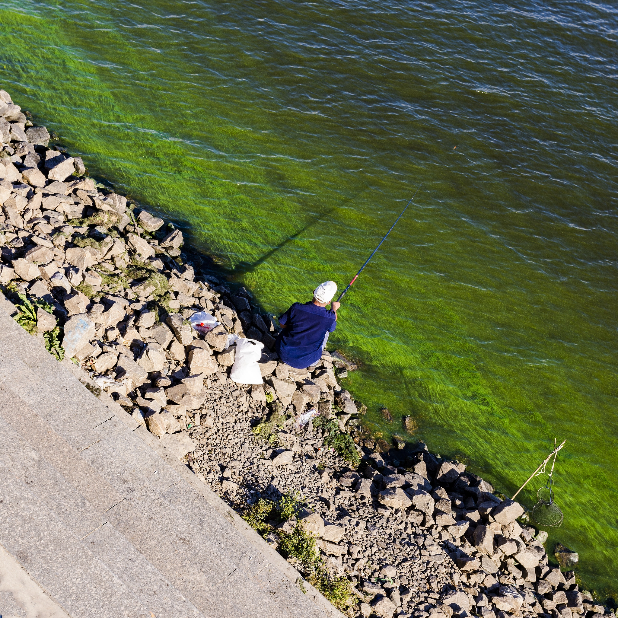 Nikon D7200 + Sigma 30mm F1.4 EX DC HSM sample photo. Fisherman photography