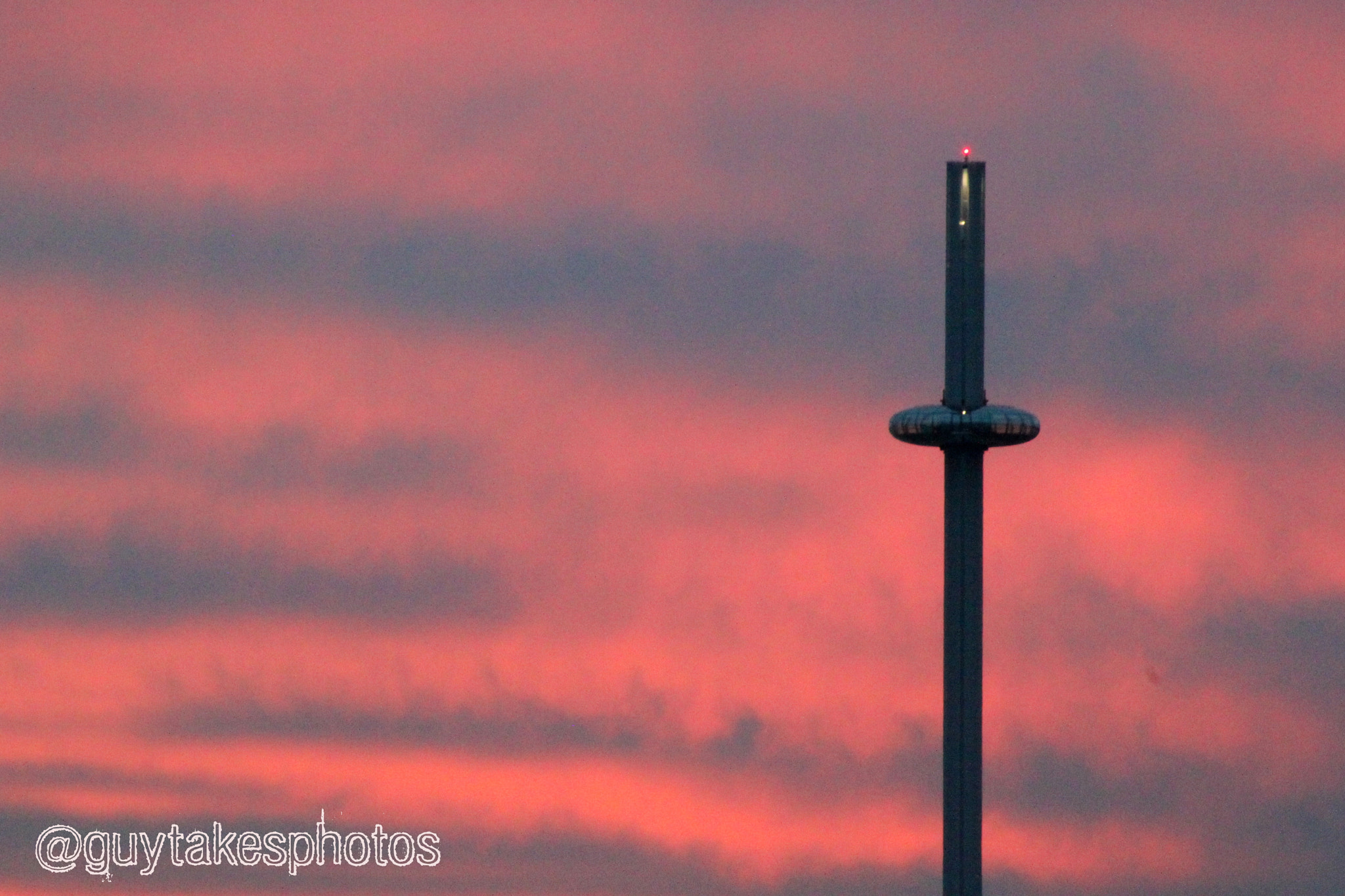 Canon EOS 500D (EOS Rebel T1i / EOS Kiss X3) + Canon EF 100-300mm F4.5-5.6 USM sample photo. The i360 against a pink sky photography