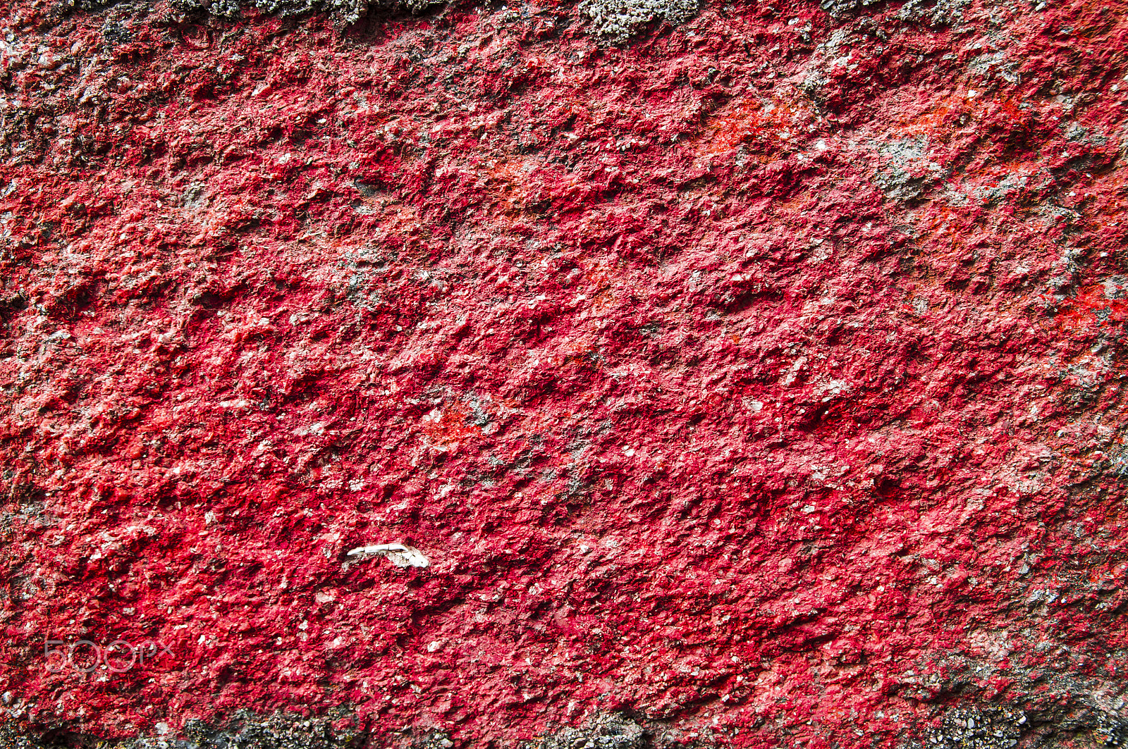 Sigma 17-70mm F2.8-4 DC Macro OS HSM sample photo. Close-up of textured stone colorful wall photography