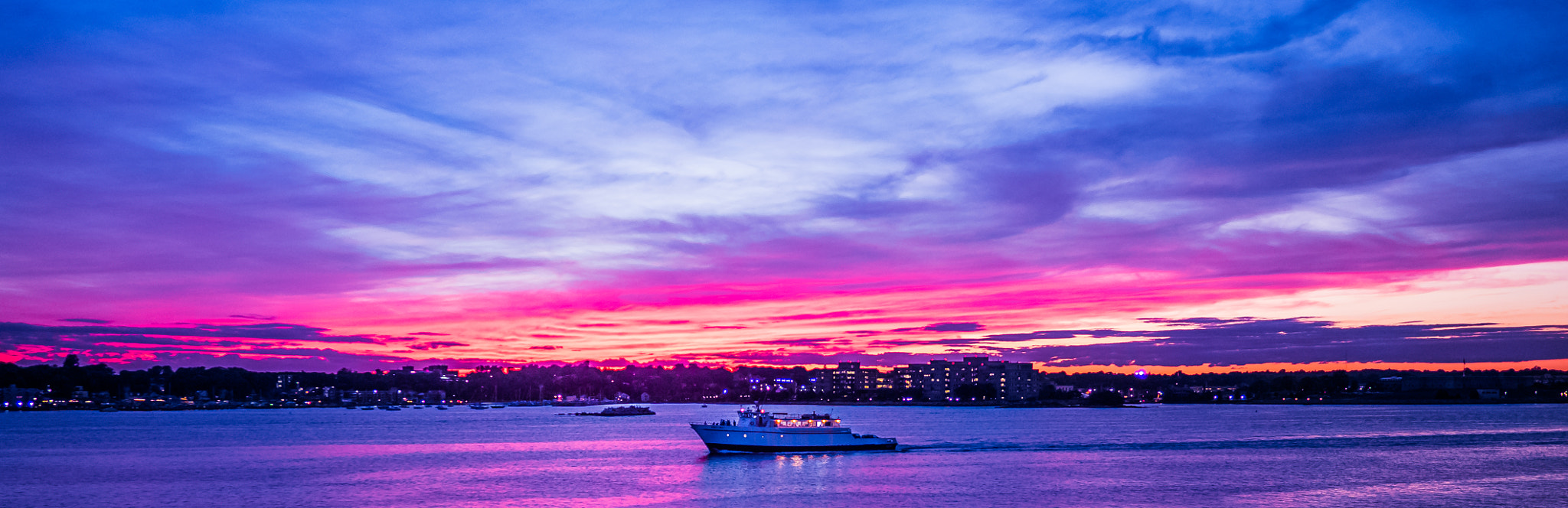 LEICA DG SUMMILUX 12/F1.4 sample photo. Boat sunset photography