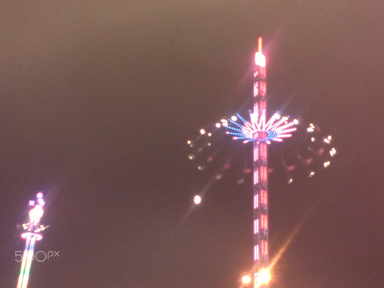 HUAWEI Y550-L01 sample photo. Fair in the evening with various lit fun rides photography