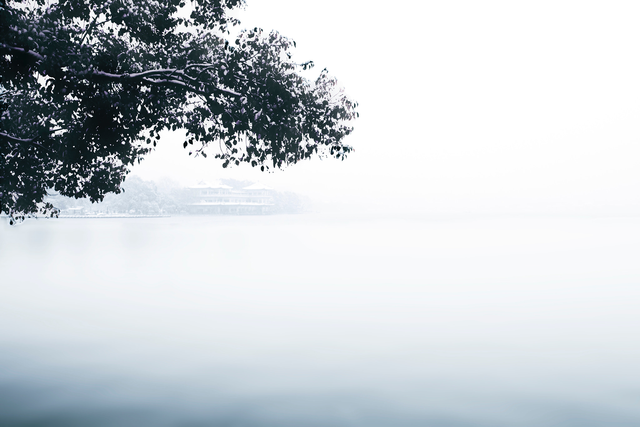 Canon EF 17-35mm f/2.8L sample photo. West lake in snow photography