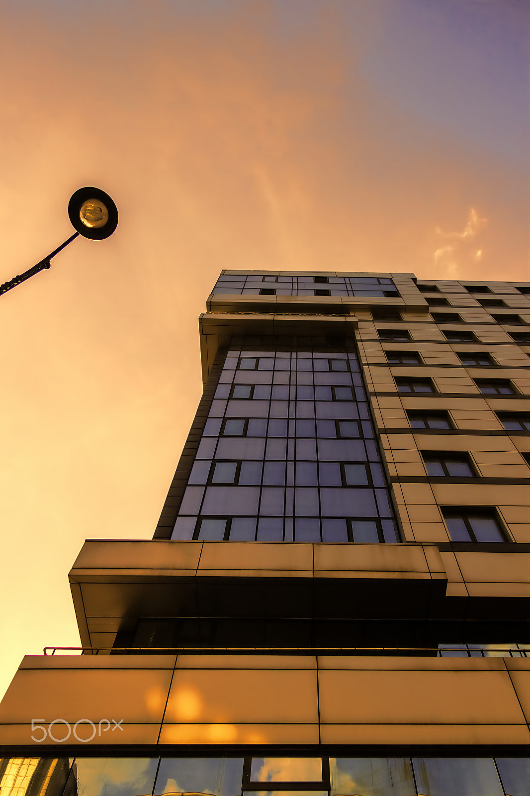 Canon EF-S 17-85mm F4-5.6 IS USM sample photo. Buildings in the sunset 1 photography