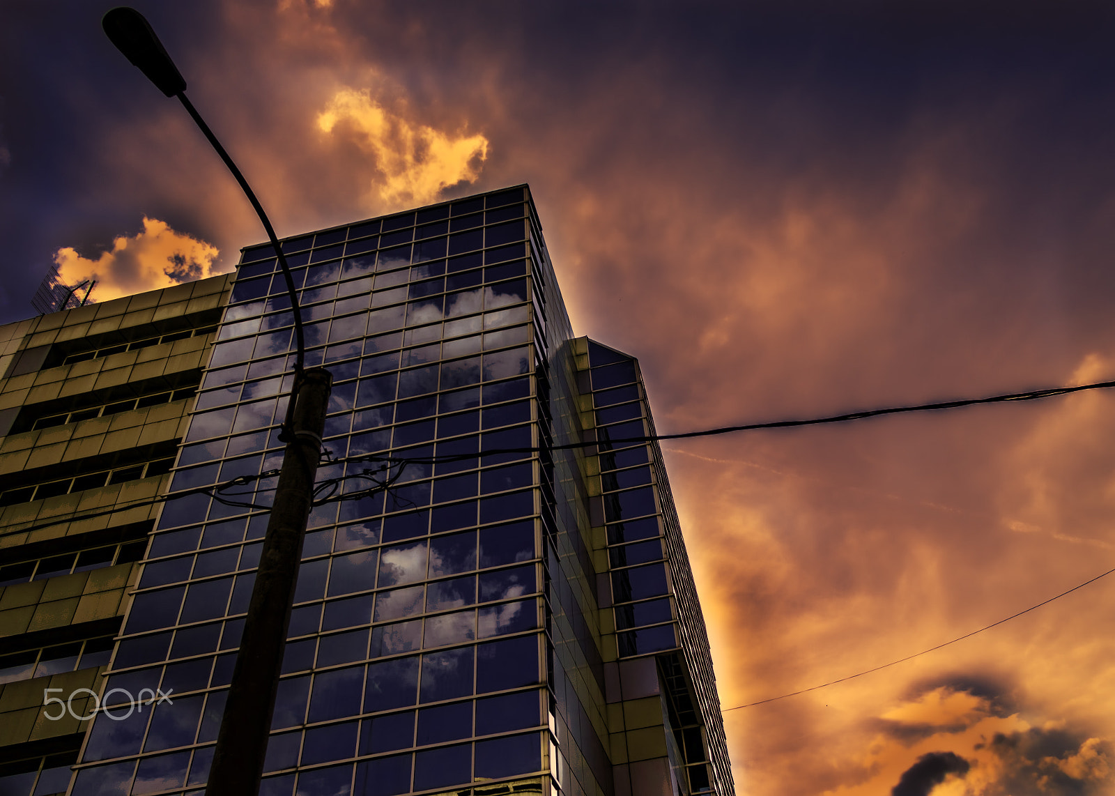 Canon EF-S 17-85mm F4-5.6 IS USM sample photo. Buildings in the sunset 2 photography