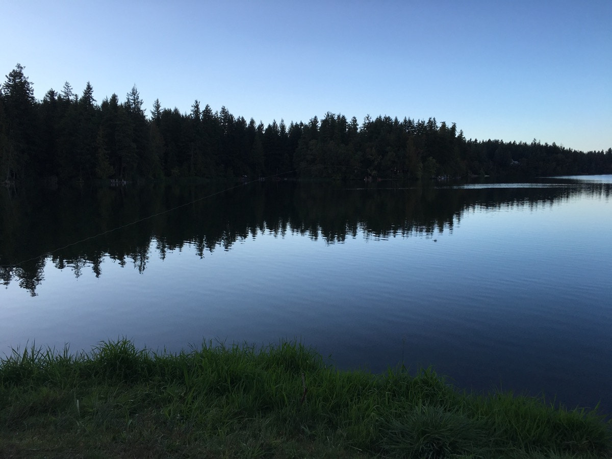 Apple iPhone8,1 sample photo. I love how the water looks so calm at dusk here at clearlake photography