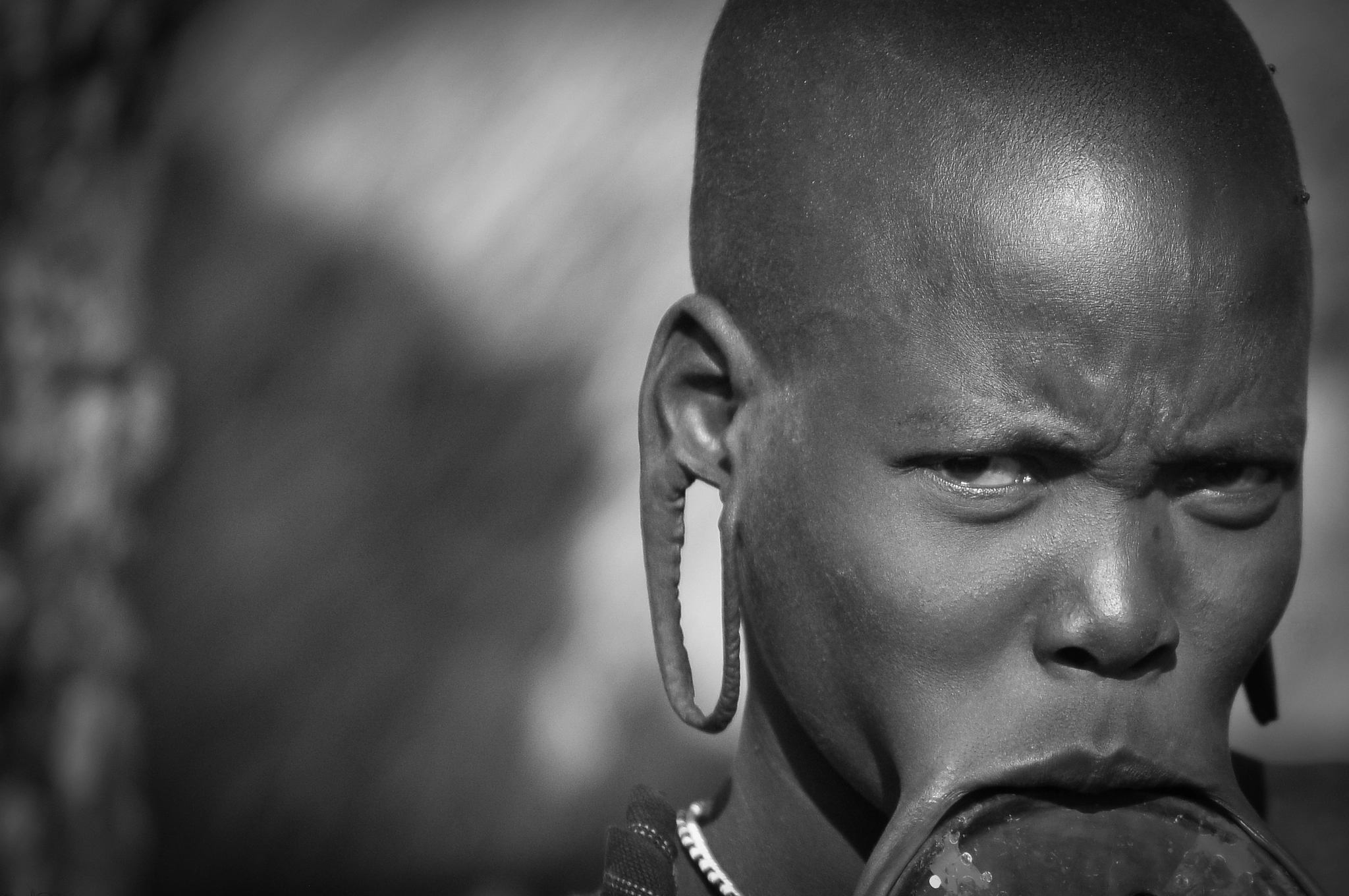 Nikon AF-S Nikkor 70-200mm F4G ED VR sample photo. Mursi woman photography