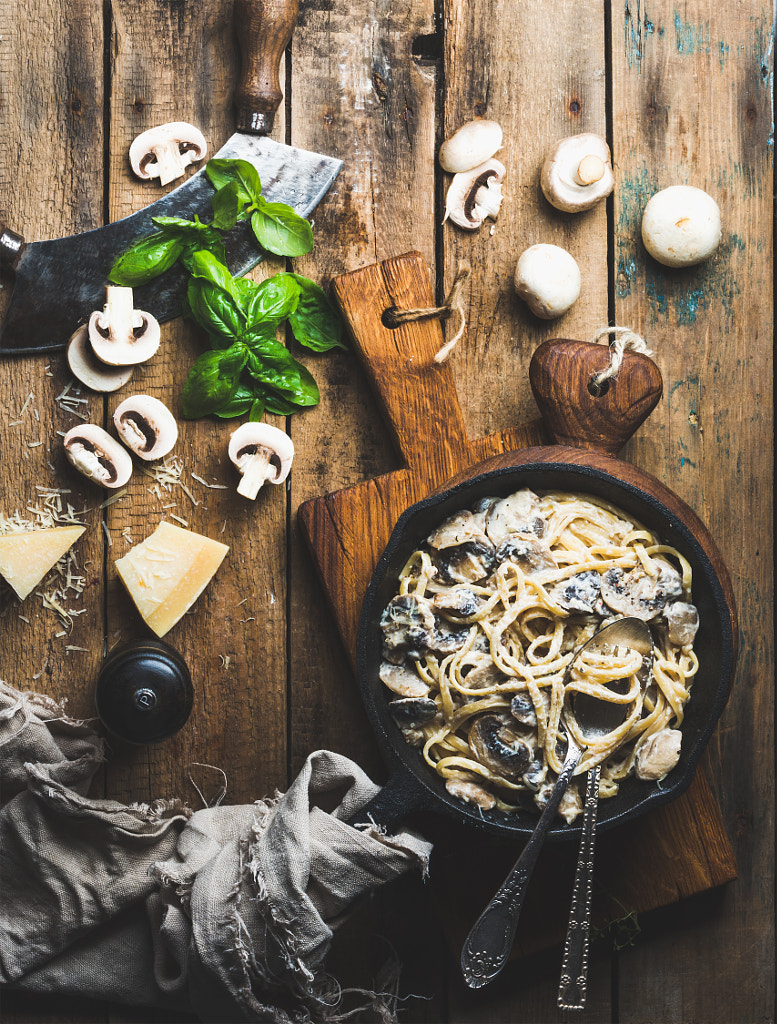Mushroom pasta spaghetti in iron pan served with parmesan, basil by Anna Ivanova on 500px.com