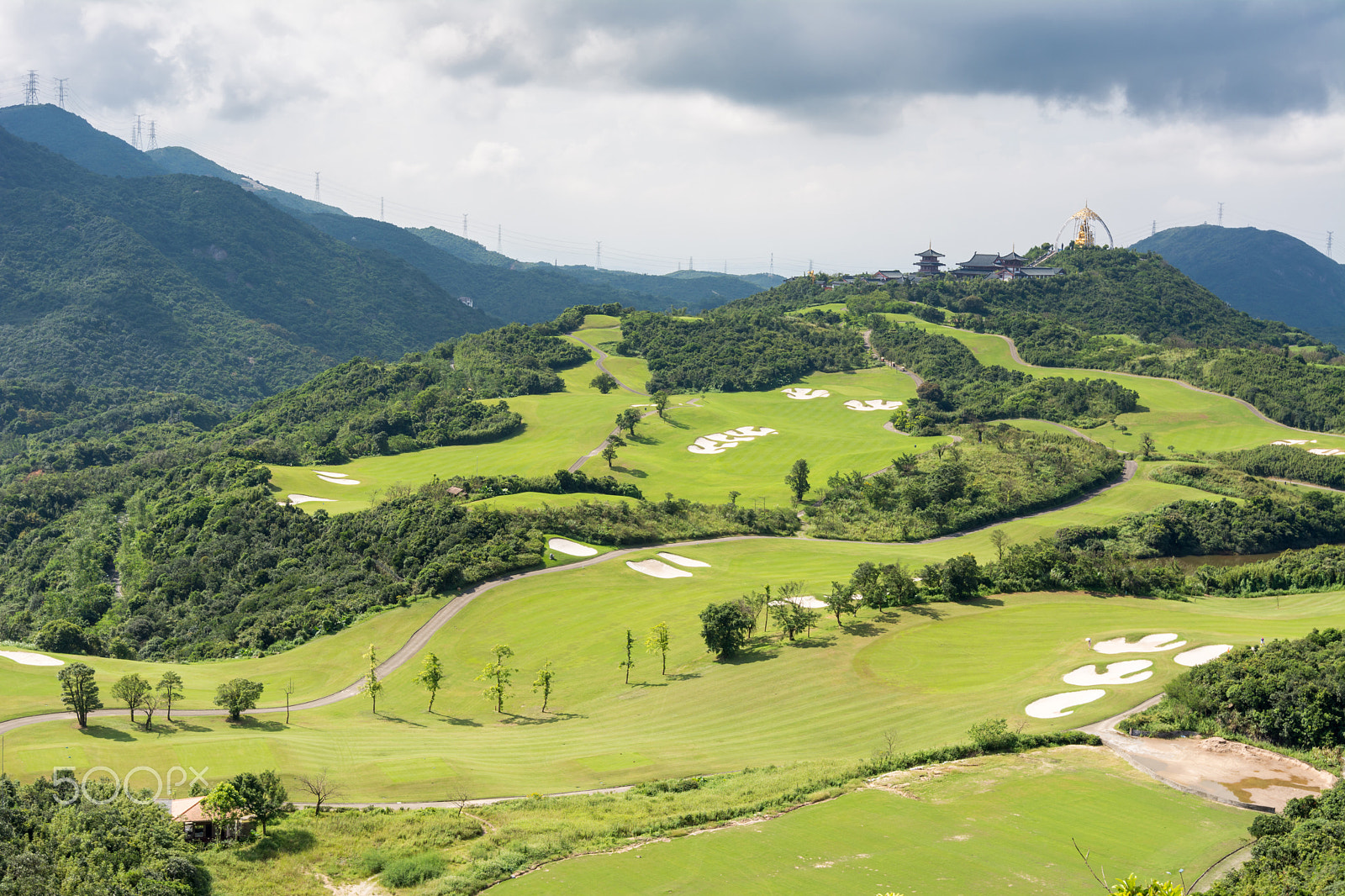 Nikon AF-S Nikkor 16-35mm F4G ED VR sample photo. Green golf field photography