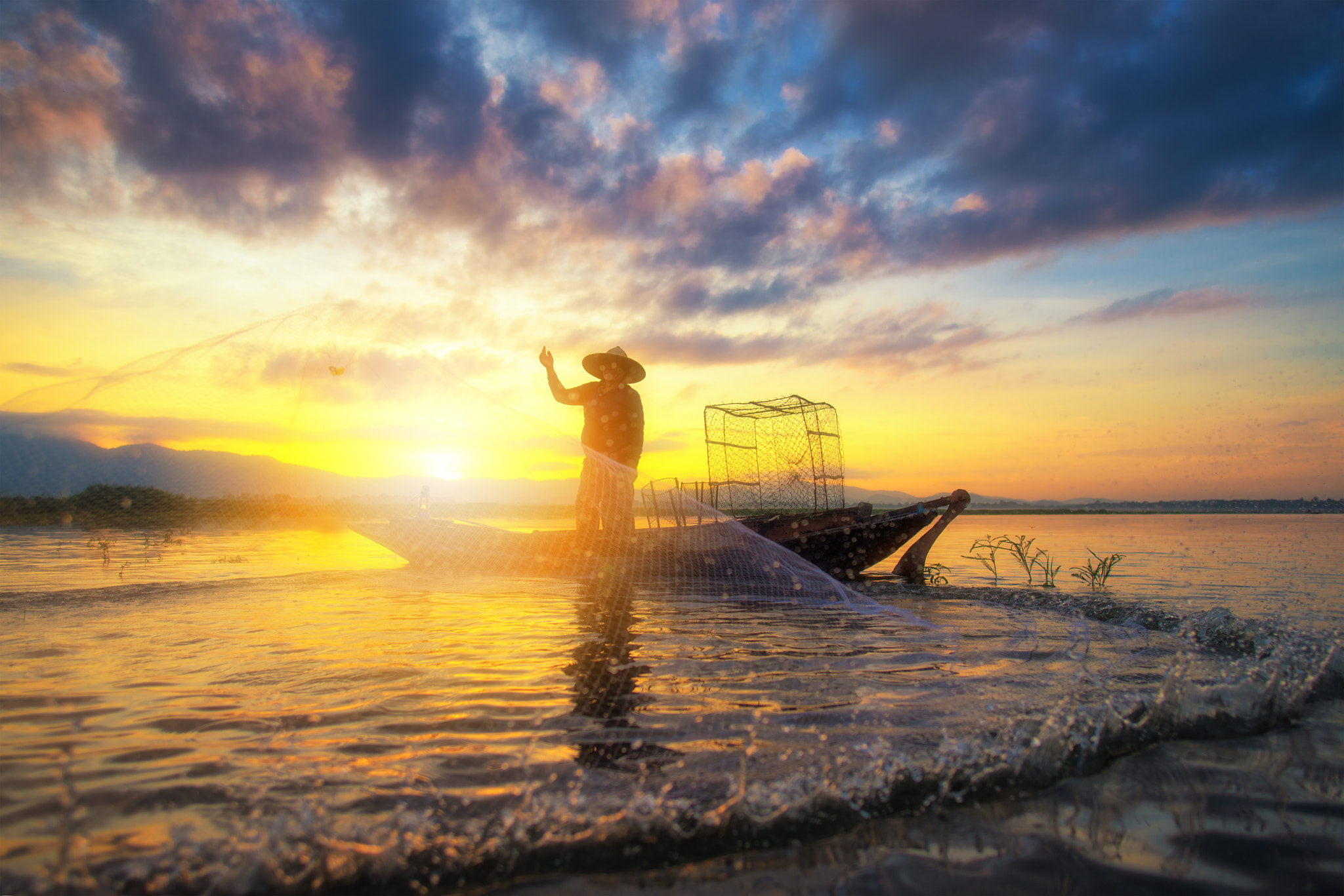 Nikon D800E + Nikon AF-S Nikkor 20mm F1.8G ED sample photo. Fisherman action photography