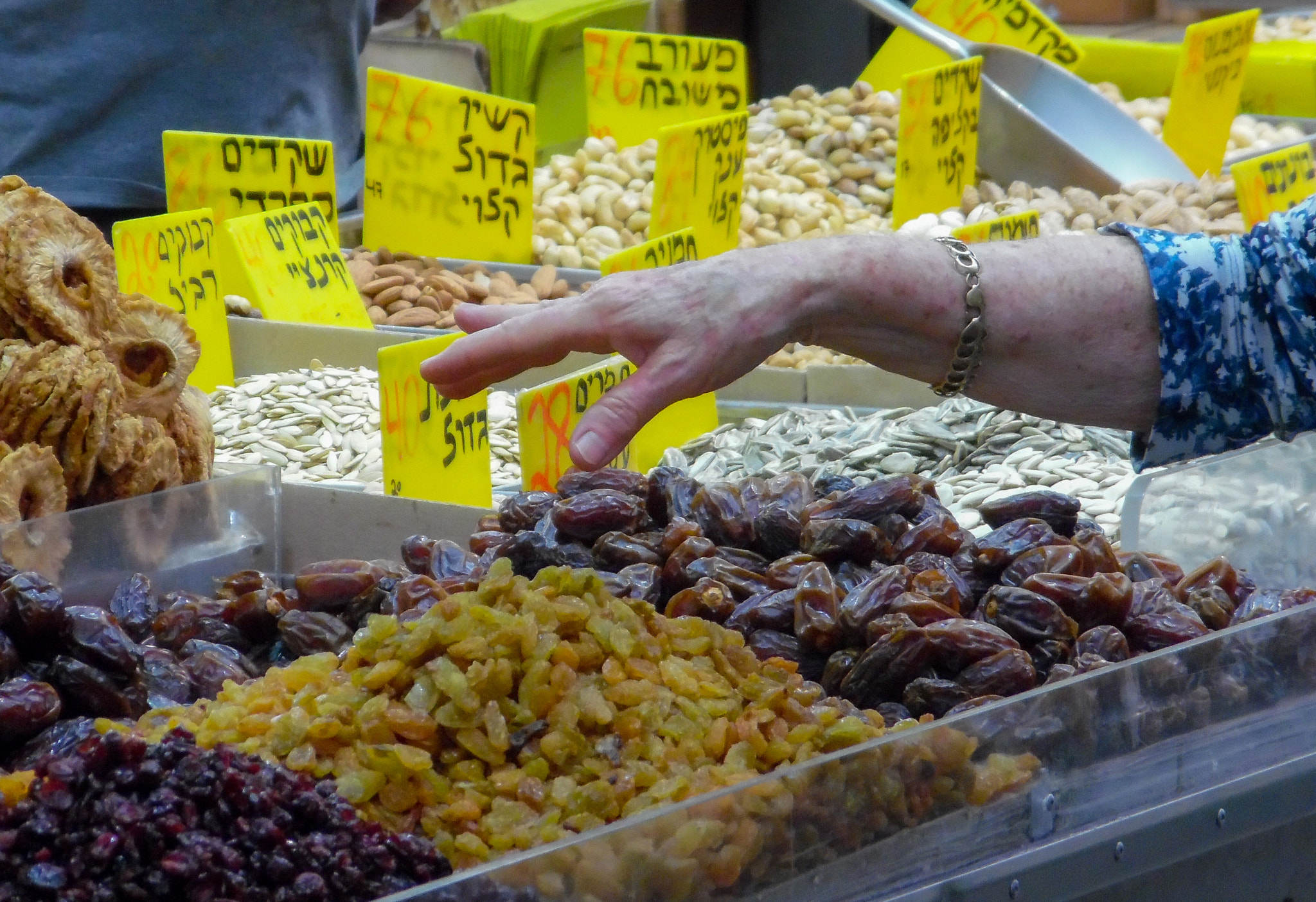 Samsung WB35F/WB36F/WB37F sample photo. Hand with dried fruit photography