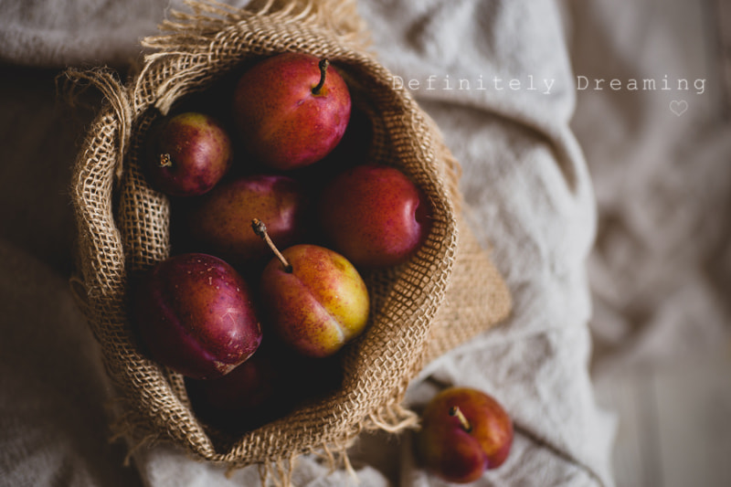 Sony a99 II + Sigma 30mm F1.4 EX DC HSM sample photo. Home grown plums in hessian bag photography