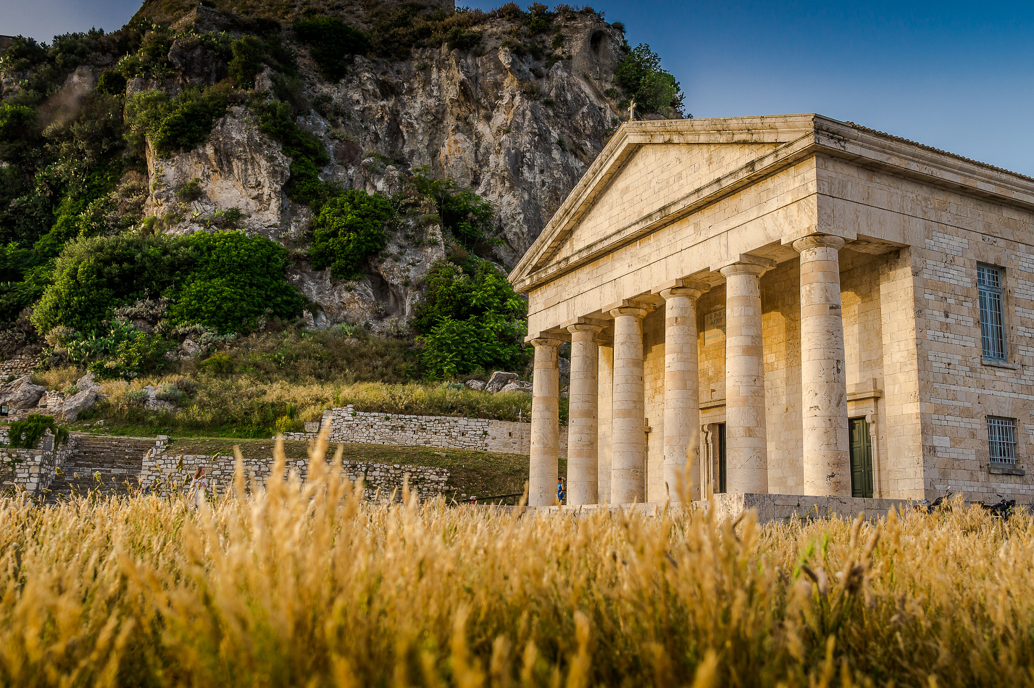 Sony Alpha a5000 (ILCE 5000) + Sigma 19mm F2.8 EX DN sample photo. Sunset in corfu-town photography