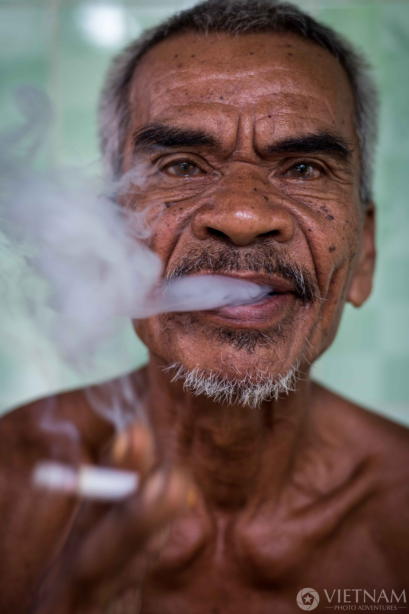 Canon EOS 6D sample photo. Young khmergrandfather smoking a cigarette photography