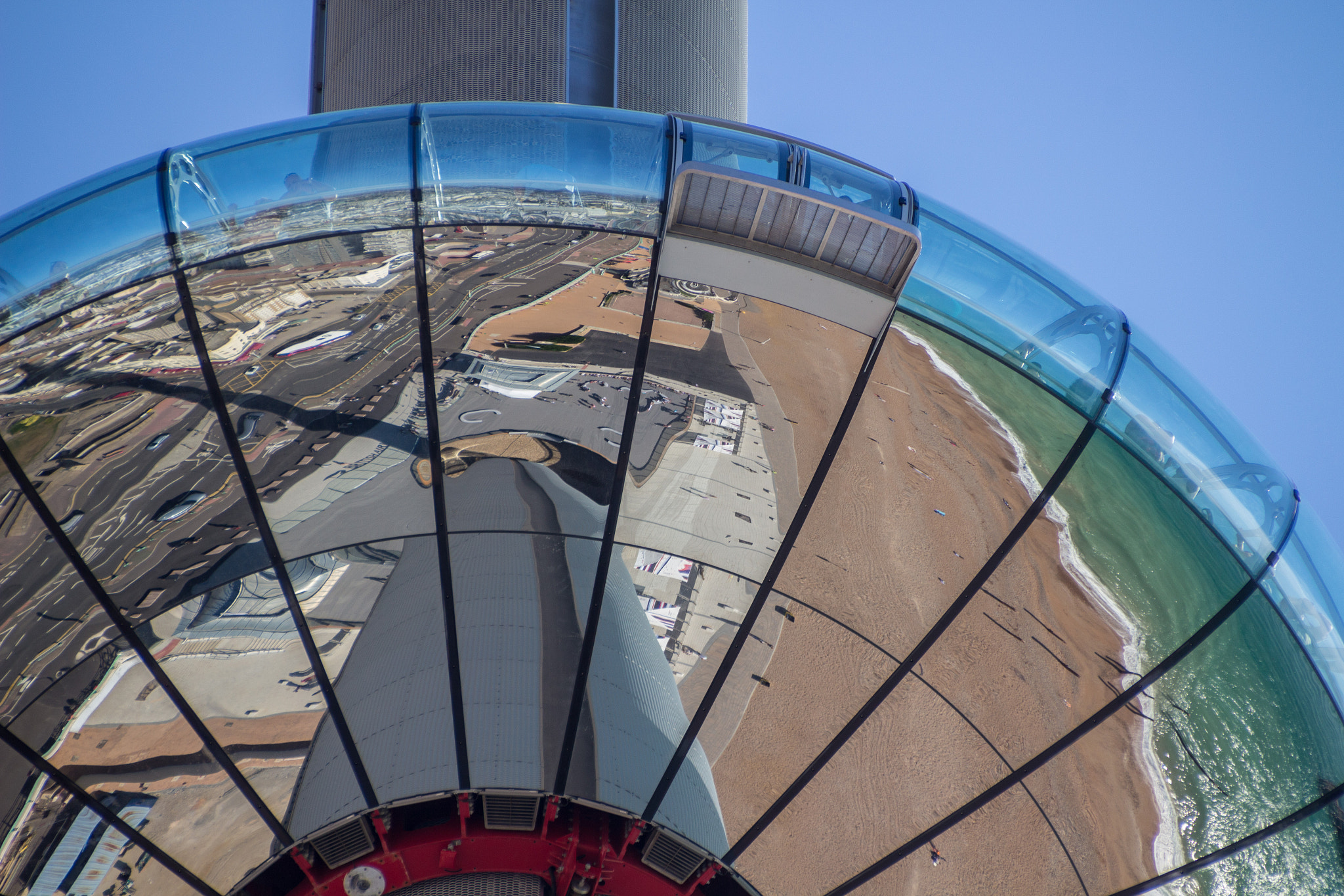 Canon EOS 100D (EOS Rebel SL1 / EOS Kiss X7) sample photo. Brighton seafront reflected on i360 photography