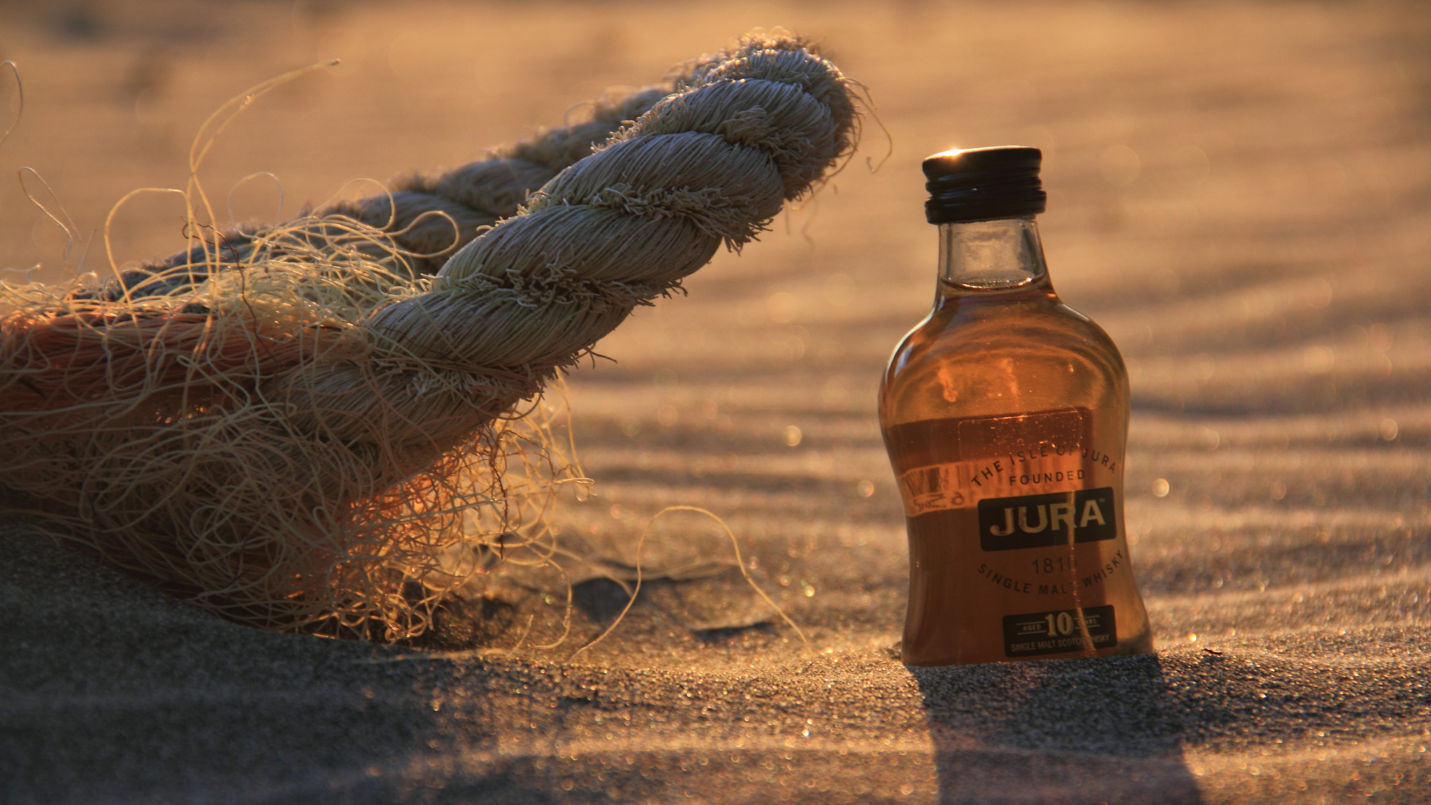 Canon EF-S 18-135mm F3.5-5.6 IS sample photo. Jura whisky at sunset photography