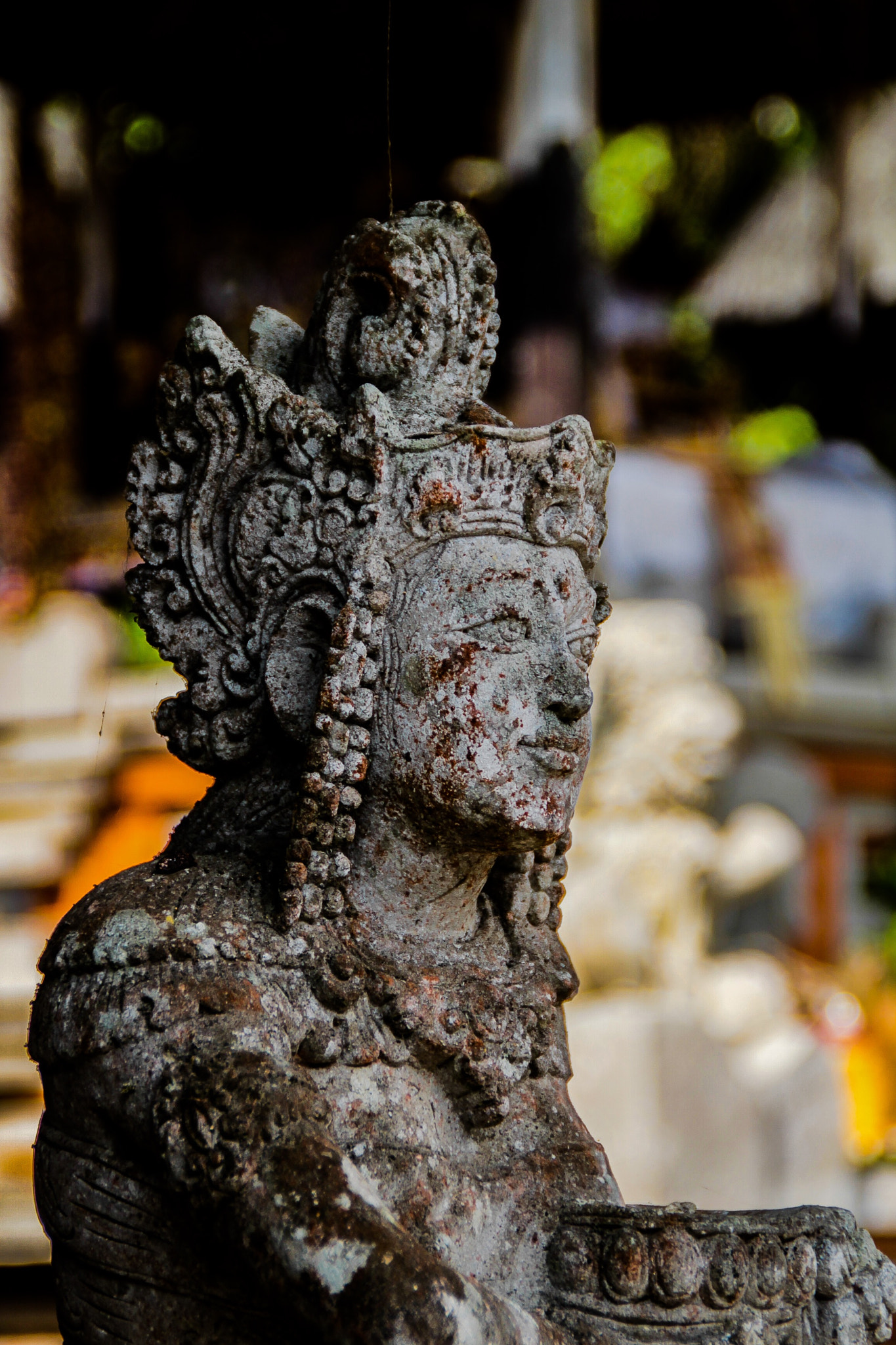 Canon EOS 500D (EOS Rebel T1i / EOS Kiss X3) + Canon 18-200mm sample photo. Statue at a temple in bali photography