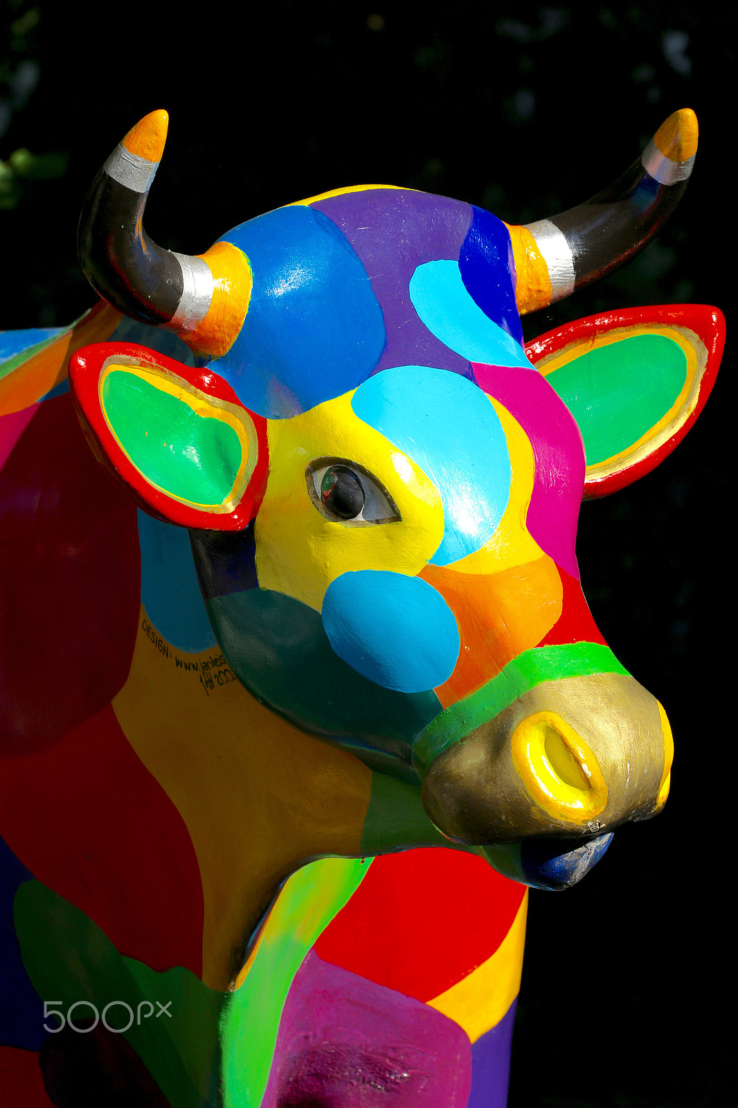 Sigma 150mm f/2.8 EX DG OS HSM APO Macro sample photo. Colored cow in the city photography
