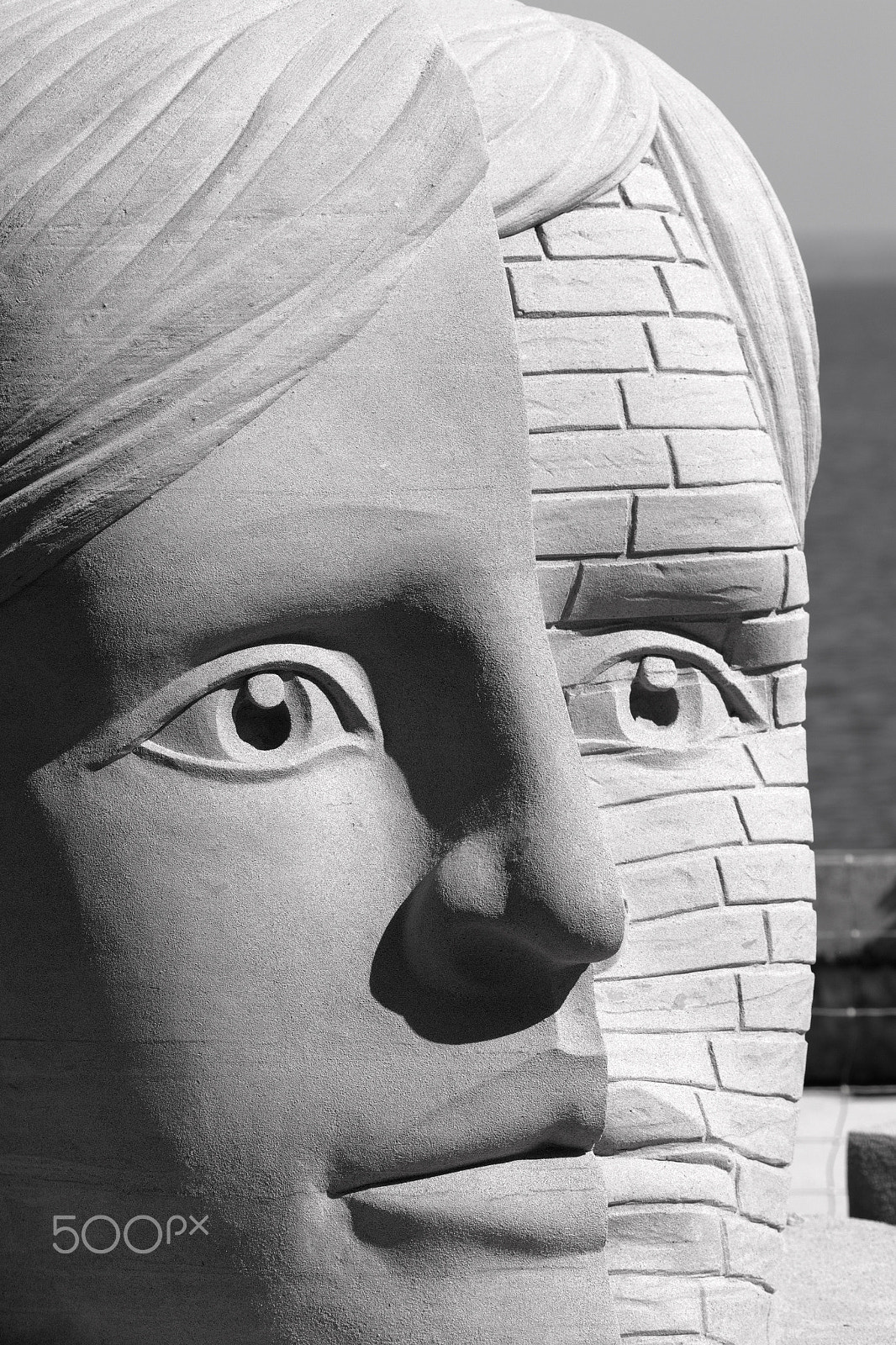 Sigma 150mm f/2.8 EX DG OS HSM APO Macro sample photo. Womans face as sand sculpture photography