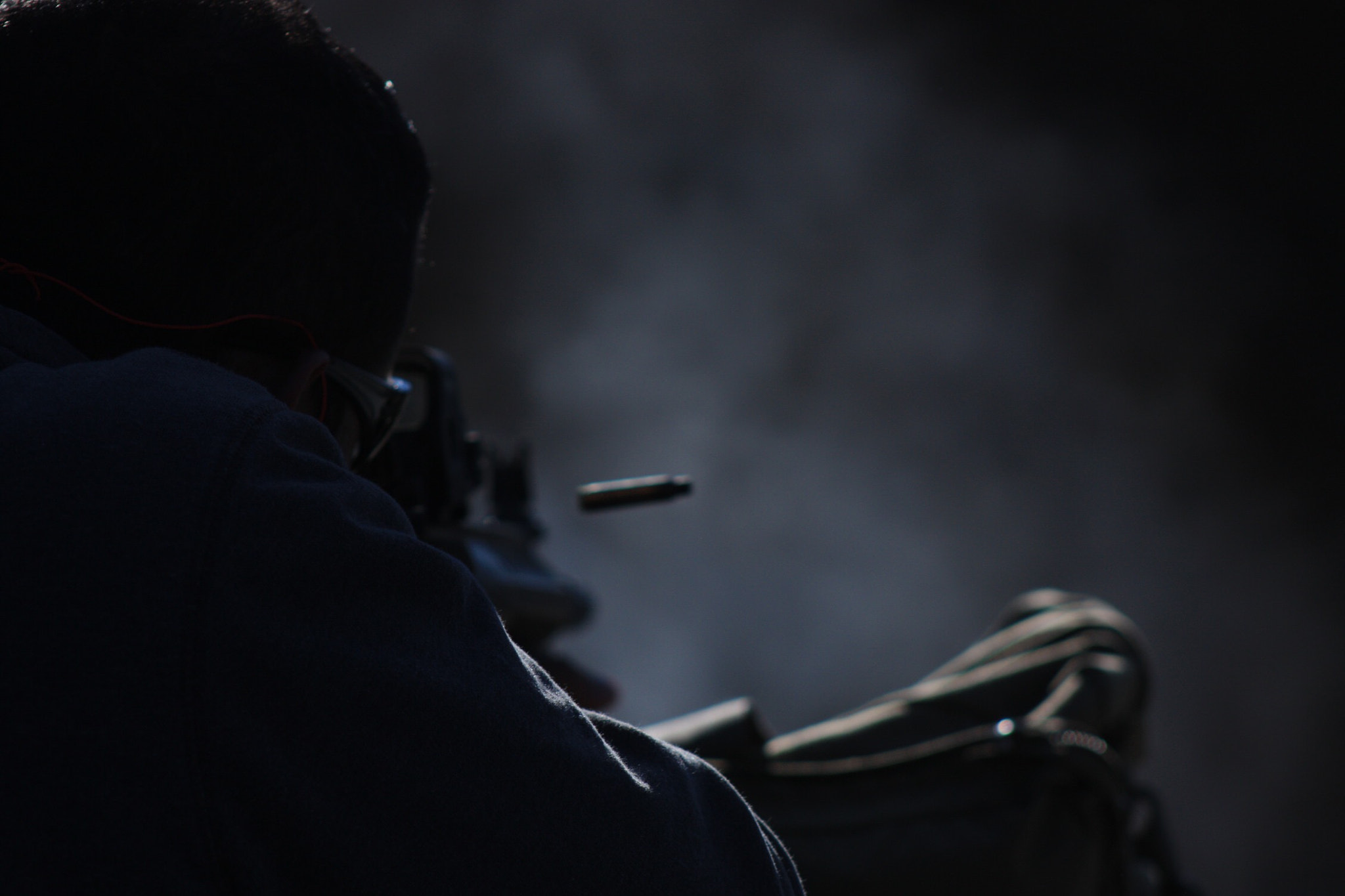 Canon EF75-300mm f/4-5.6 sample photo. Firearms photography