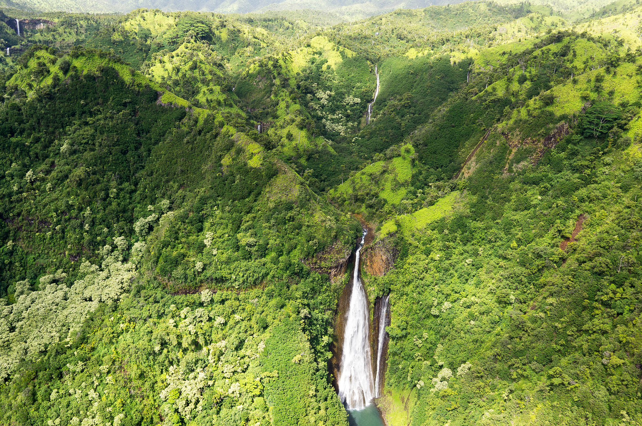 Sony Alpha NEX-5N + Sigma 19mm F2.8 EX DN sample photo. Manawaiopuna falls photography