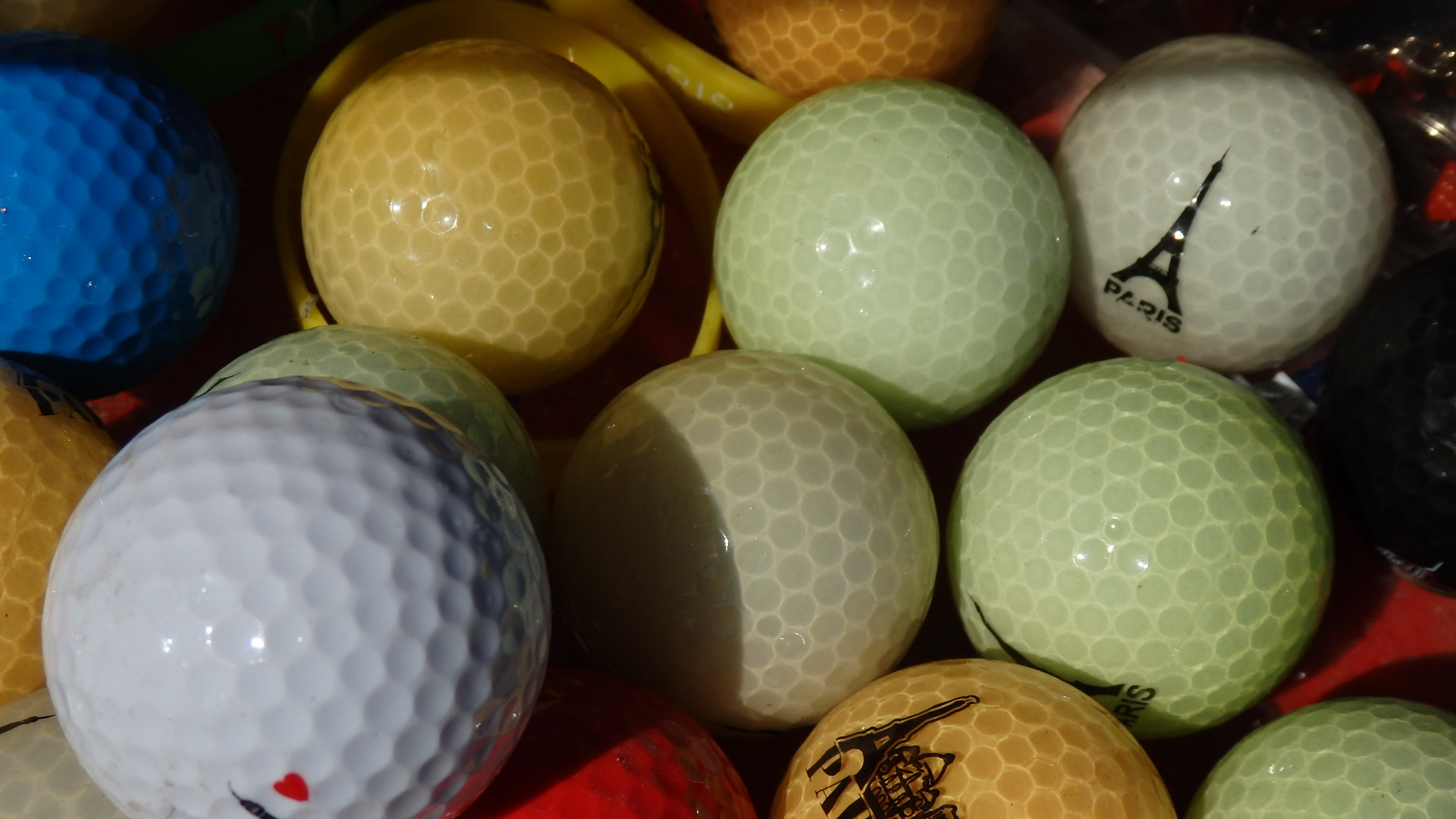 Olympus SZ-16,DZ-105 sample photo. Paris golf ball photography