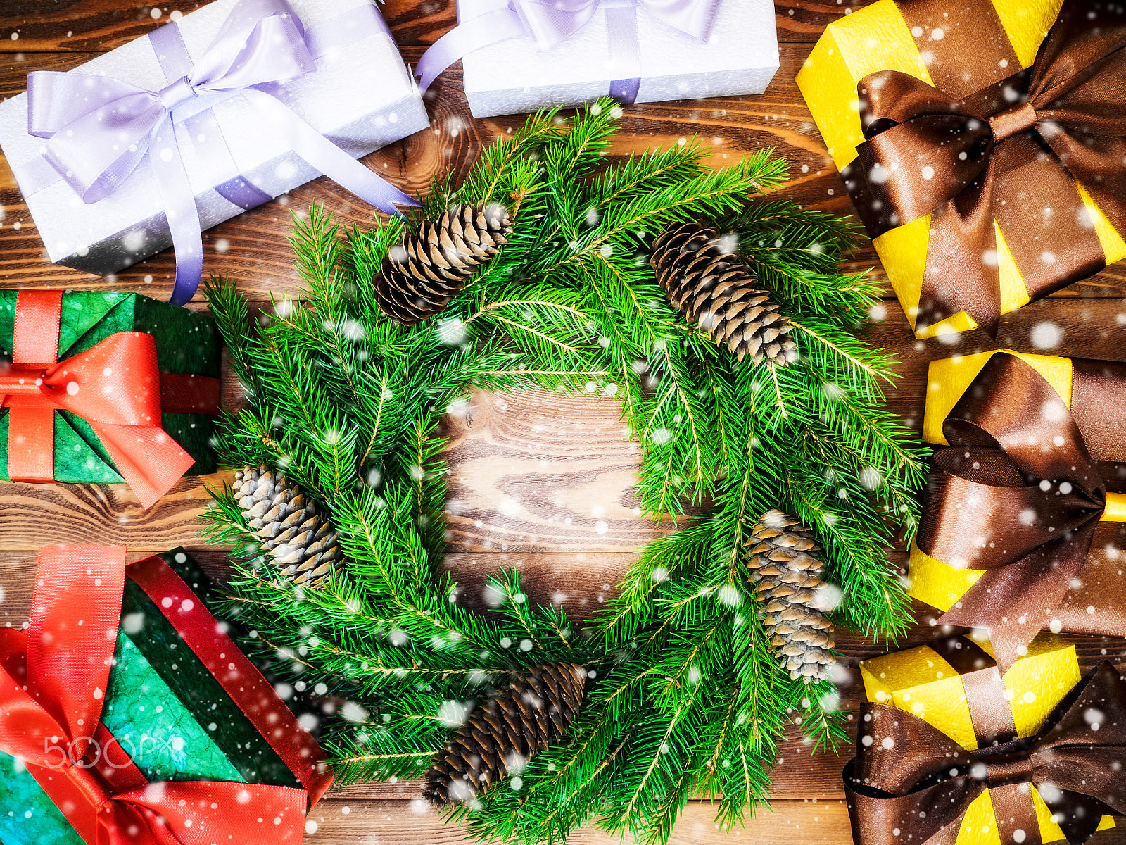 Olympus OM-D E-M1 + OLYMPUS 14-54mm Lens sample photo. Wreath on the wooden board. wrapped gift boxes. christmas and new year concept photography