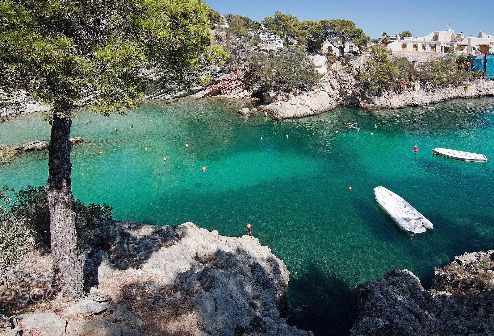 Nikon D7100 + AF Nikkor 35mm f/2 sample photo. Cala fornells beach photography