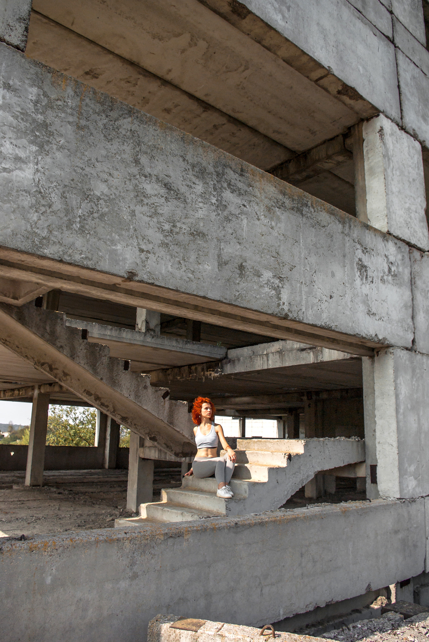 Pentax smc DA 18-55mm F3.5-5.6 ED AL II (IF) sample photo. Fitness girl on the old stairs in an abandoned factory photography