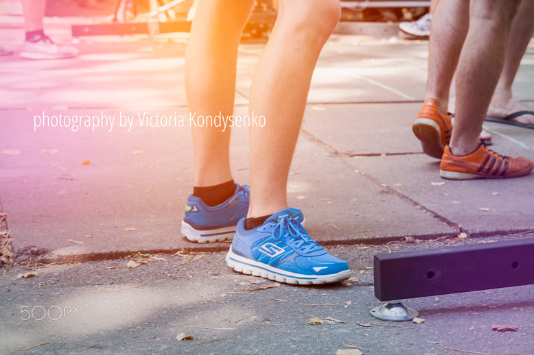 Canon EOS 1000D (EOS Digital Rebel XS / EOS Kiss F) sample photo. Feet of an athlete running photography