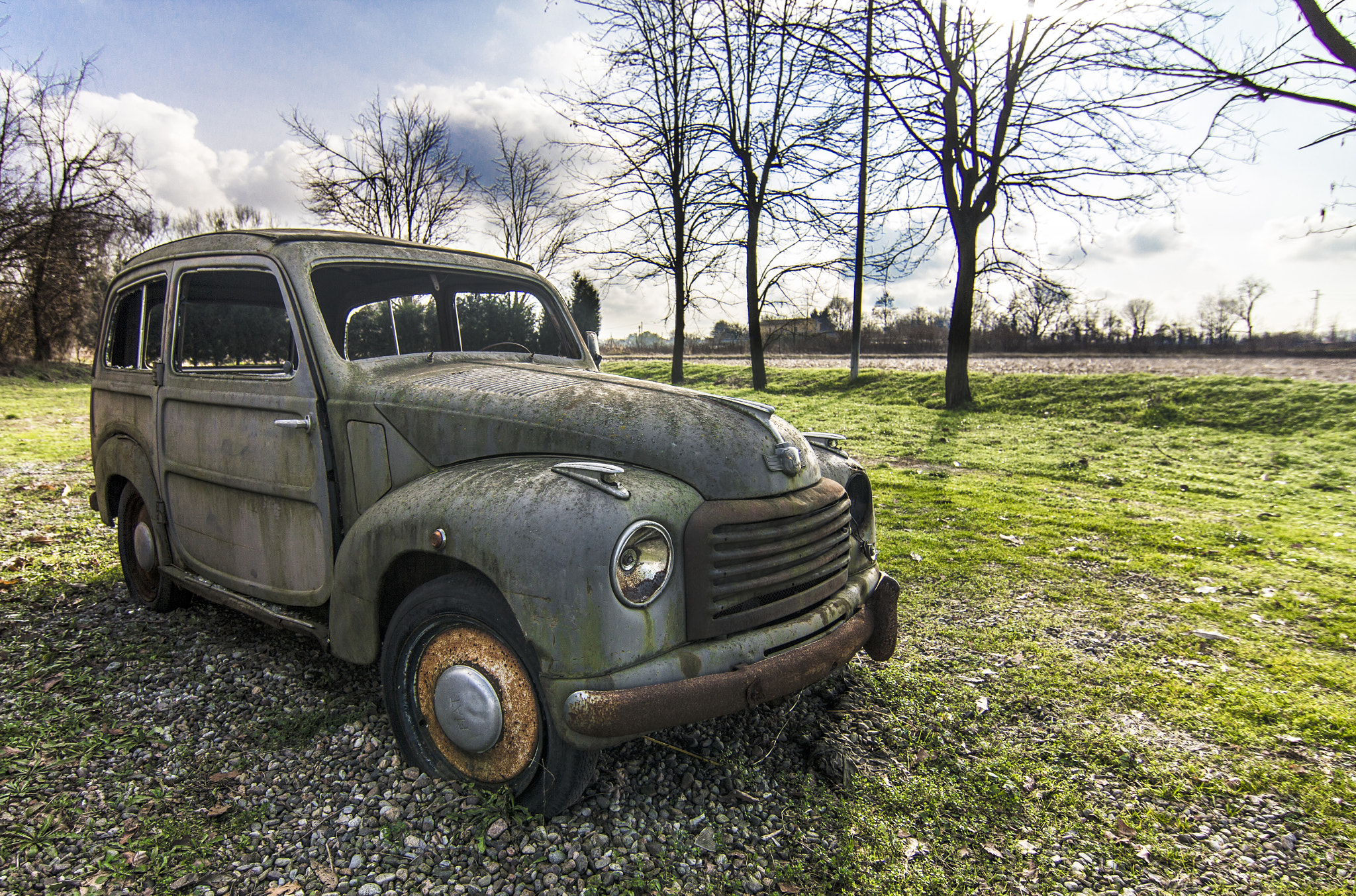 Tokina AT-X Pro 12-24mm F4 (IF) DX sample photo. Old car abandoned in the nature photography