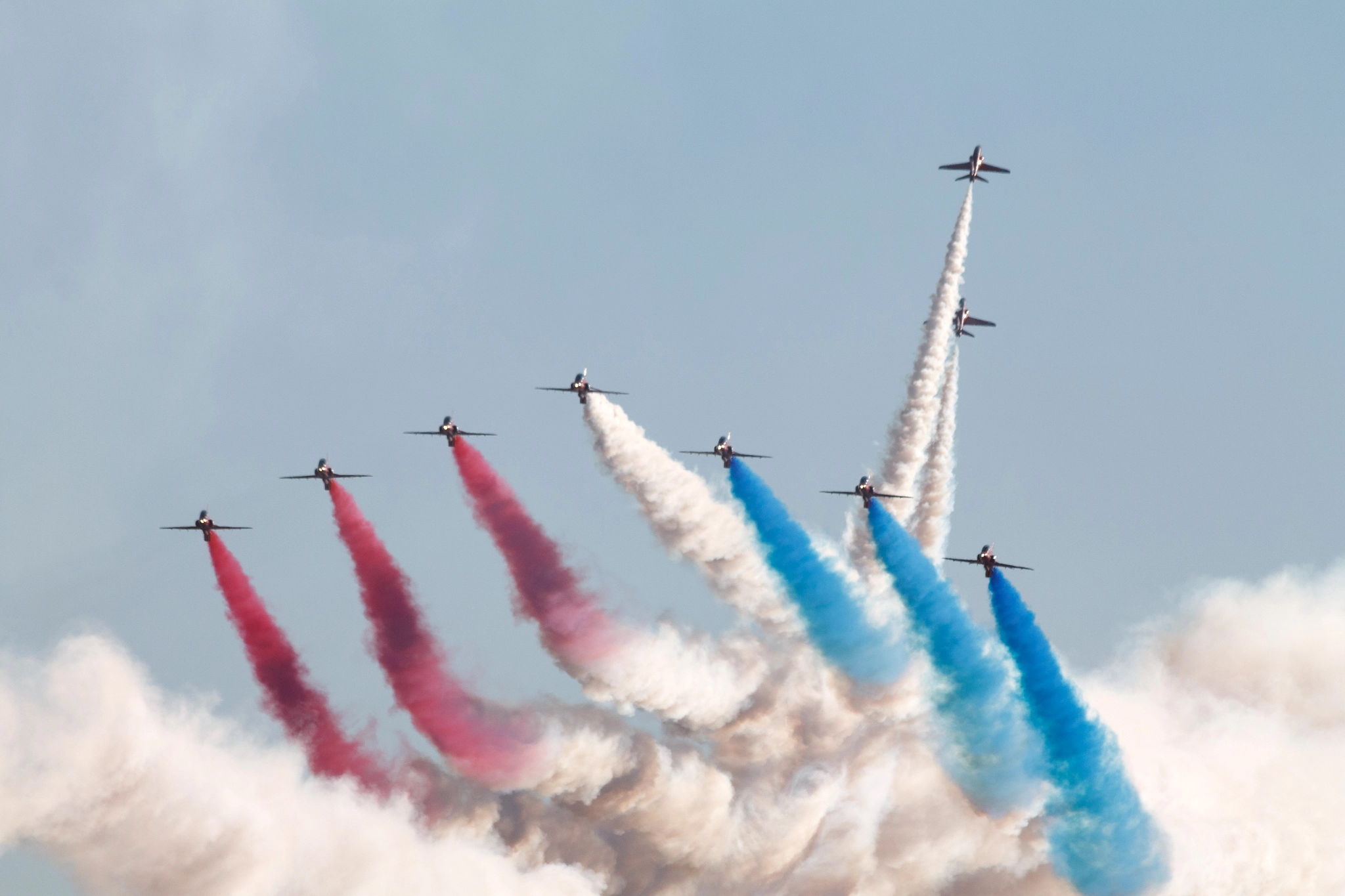 Canon EF 70-300mm F4-5.6 IS USM sample photo. Red arrows smoke photography