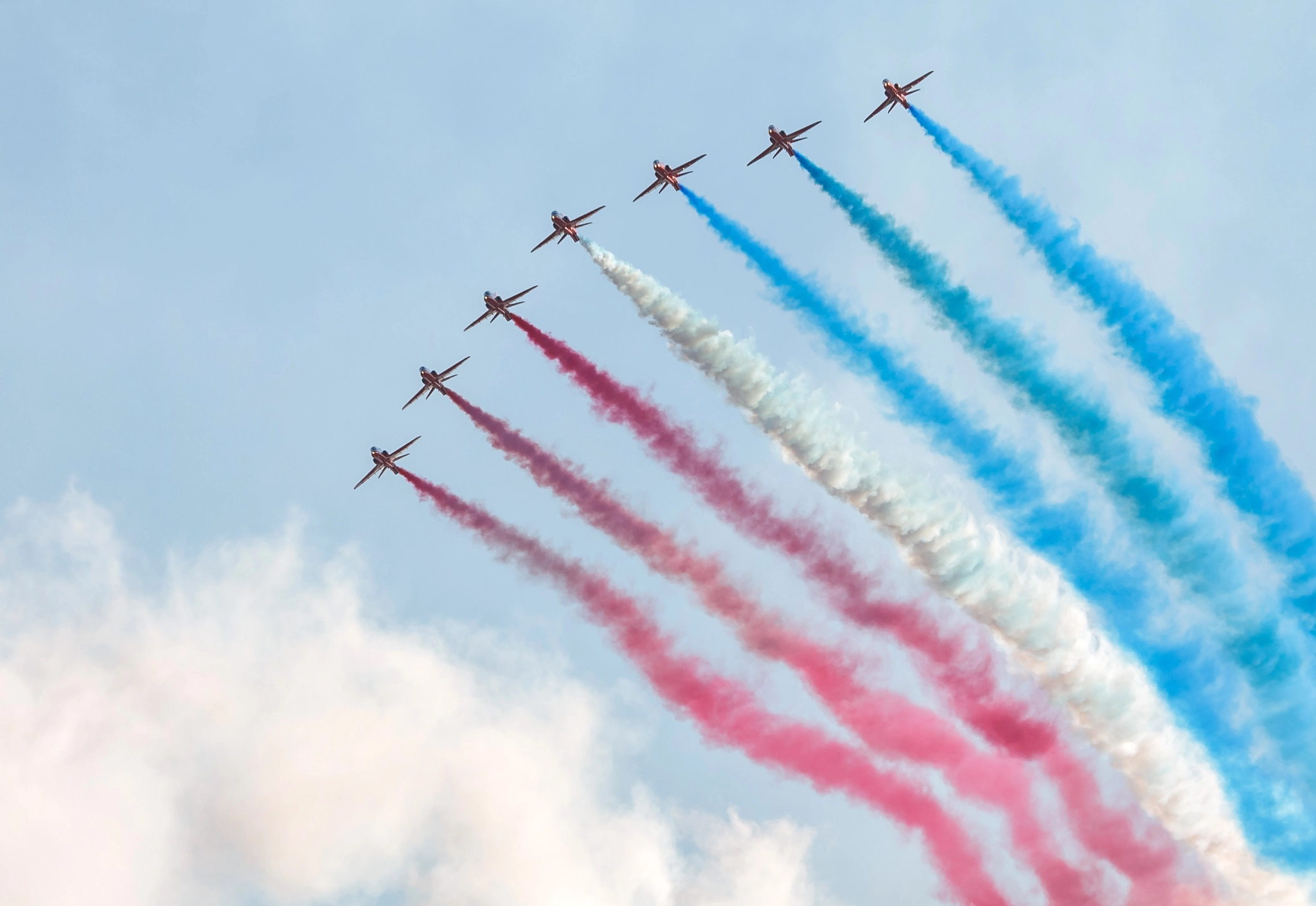 Canon EF 70-300mm F4-5.6 IS USM sample photo. Red arrows coloured smoke photography