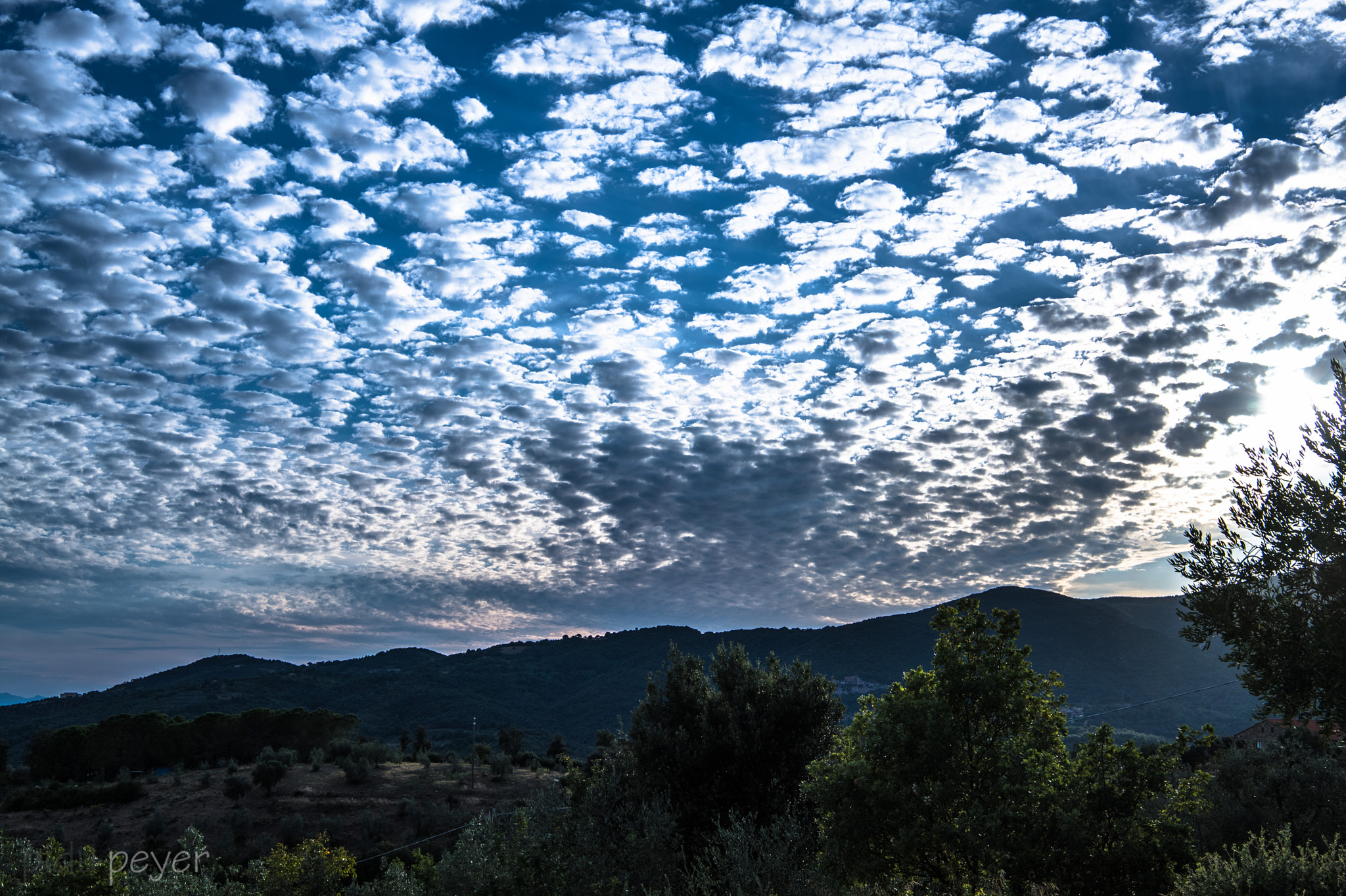 Nikon AF-S Nikkor 24-70mm F2.8E ED VR sample photo. Fleecy clouds photography