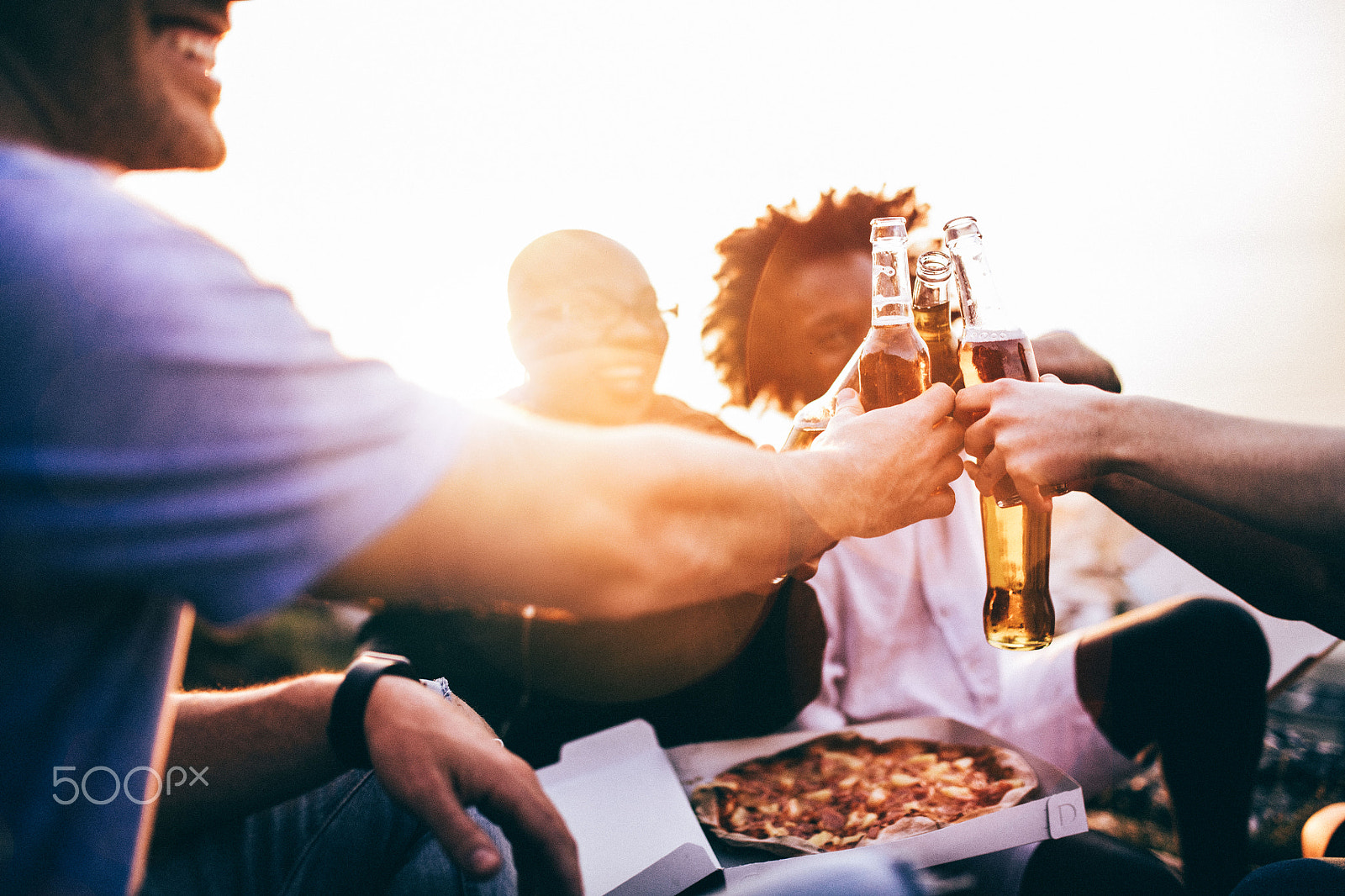 Canon EOS 5DS + Sigma 35mm F1.4 DG HSM Art sample photo. Friends celebrating and toasting with beer bottles photography