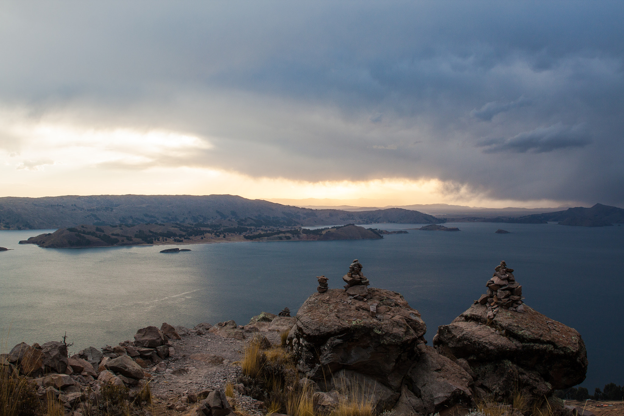 Canon EOS 500D (EOS Rebel T1i / EOS Kiss X3) + Sigma 24-70mm F2.8 EX DG Macro sample photo. Sunset in lake titicaca photography