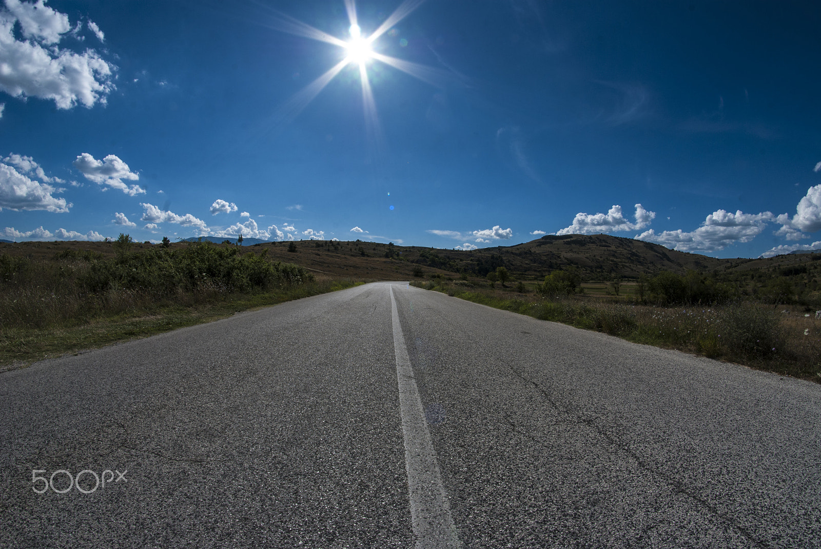 Nikon D80 + Samyang 8mm F3.5 Aspherical IF MC Fisheye sample photo. A street towards nowhere photography