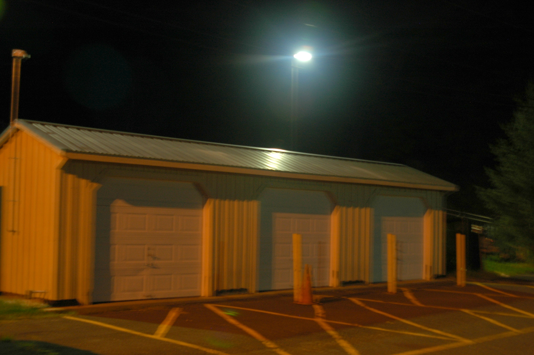 Nikon D70s sample photo. Garage in night light photography