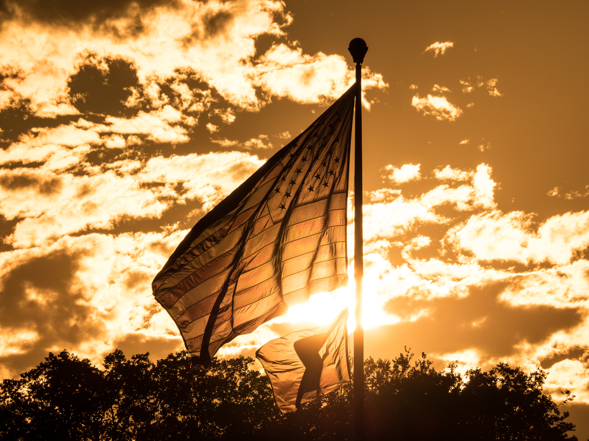 Olympus OM-D E-M5 II sample photo. Sunset of patriotism photography