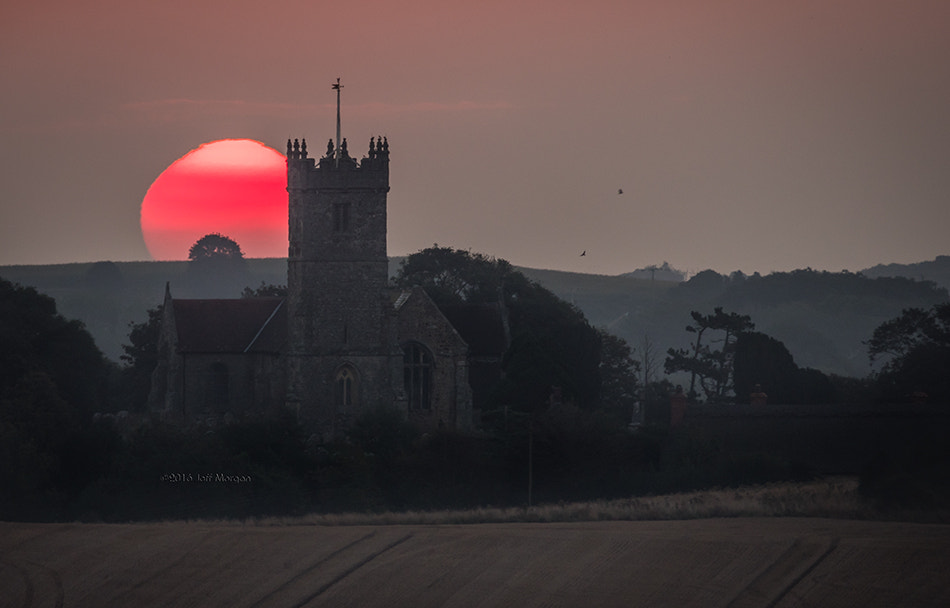 Panasonic Lumix DMC-GX8 sample photo. Sunrise behind all saints' church photography