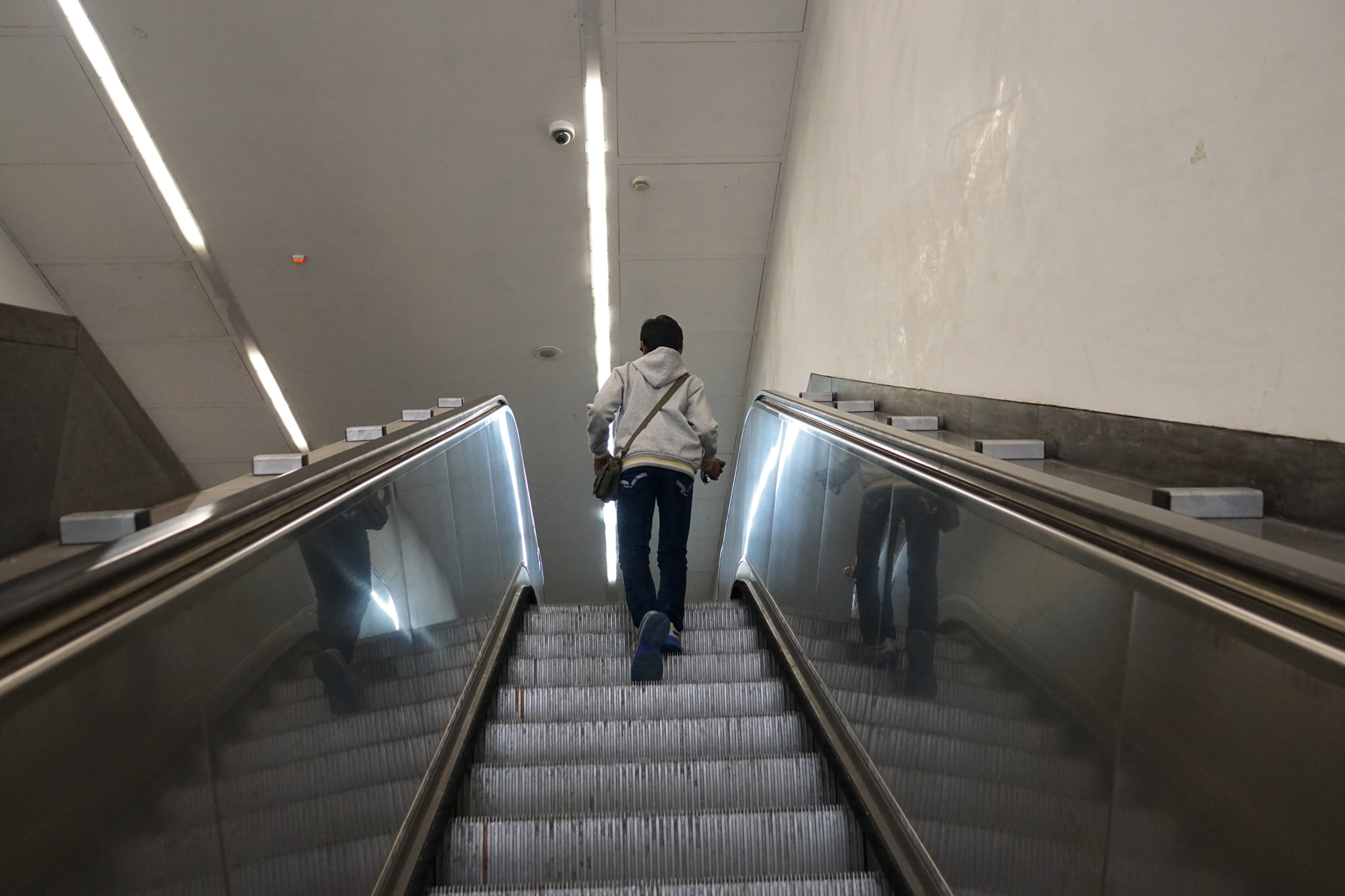 Sony a6000 + Sony Sonnar T* E 24mm F1.8 ZA sample photo. Moving escalator photography