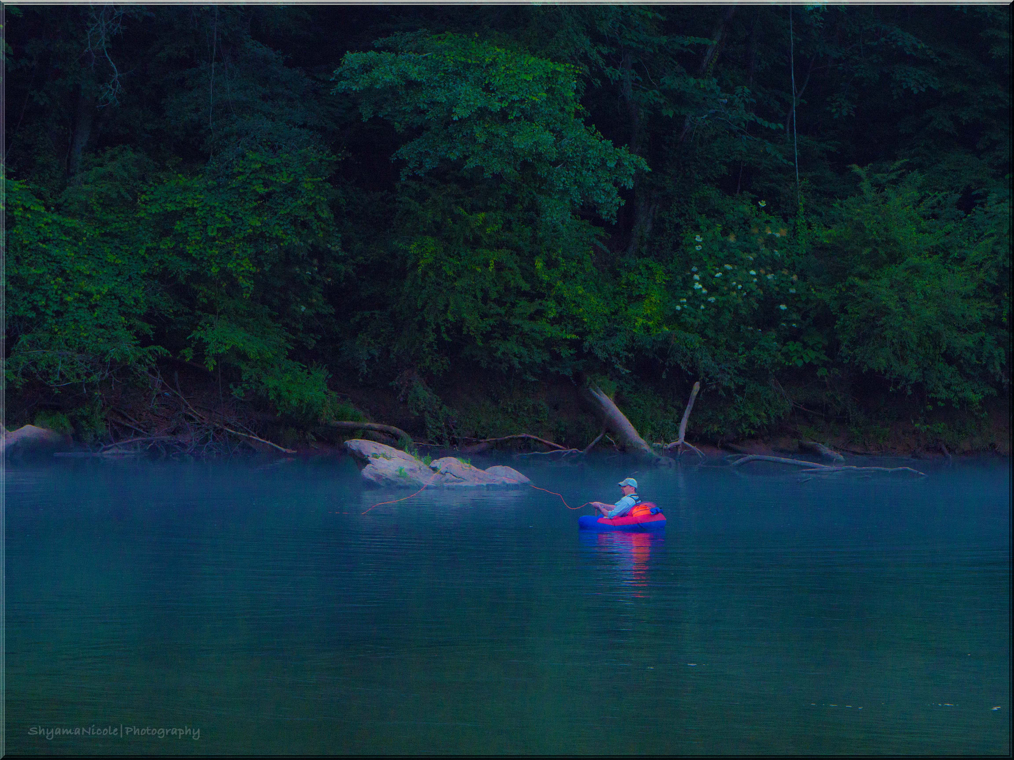 Panasonic Lumix DMC-GH3 + Panasonic Lumix G Vario 14-45mm F3.5-5.6 ASPH OIS sample photo. A peaceful fisherman floating on the chattahoochee river photography