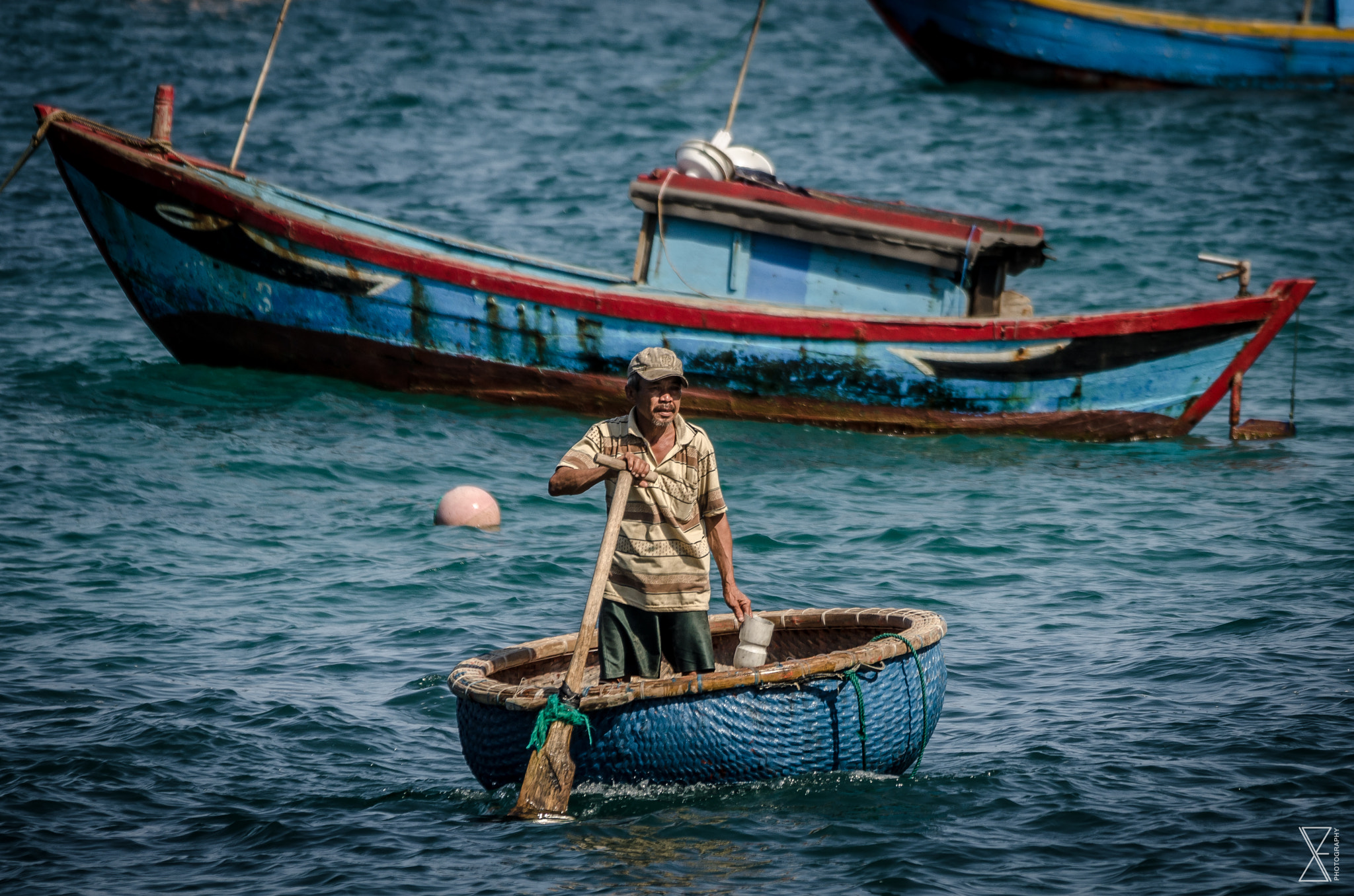 Sigma 120-400mm F4.5-5.6 DG OS HSM sample photo. Round boat fisherman photography