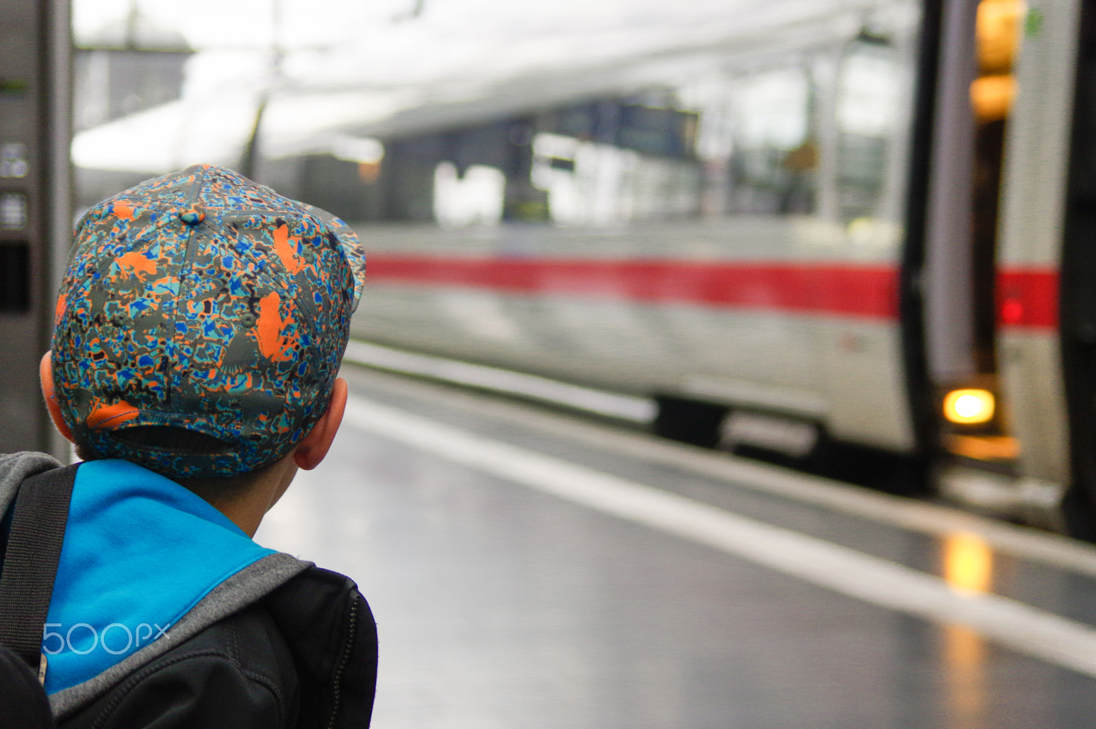 Pentax K-3 sample photo. Boy with a cap waits for train on railway platform photography